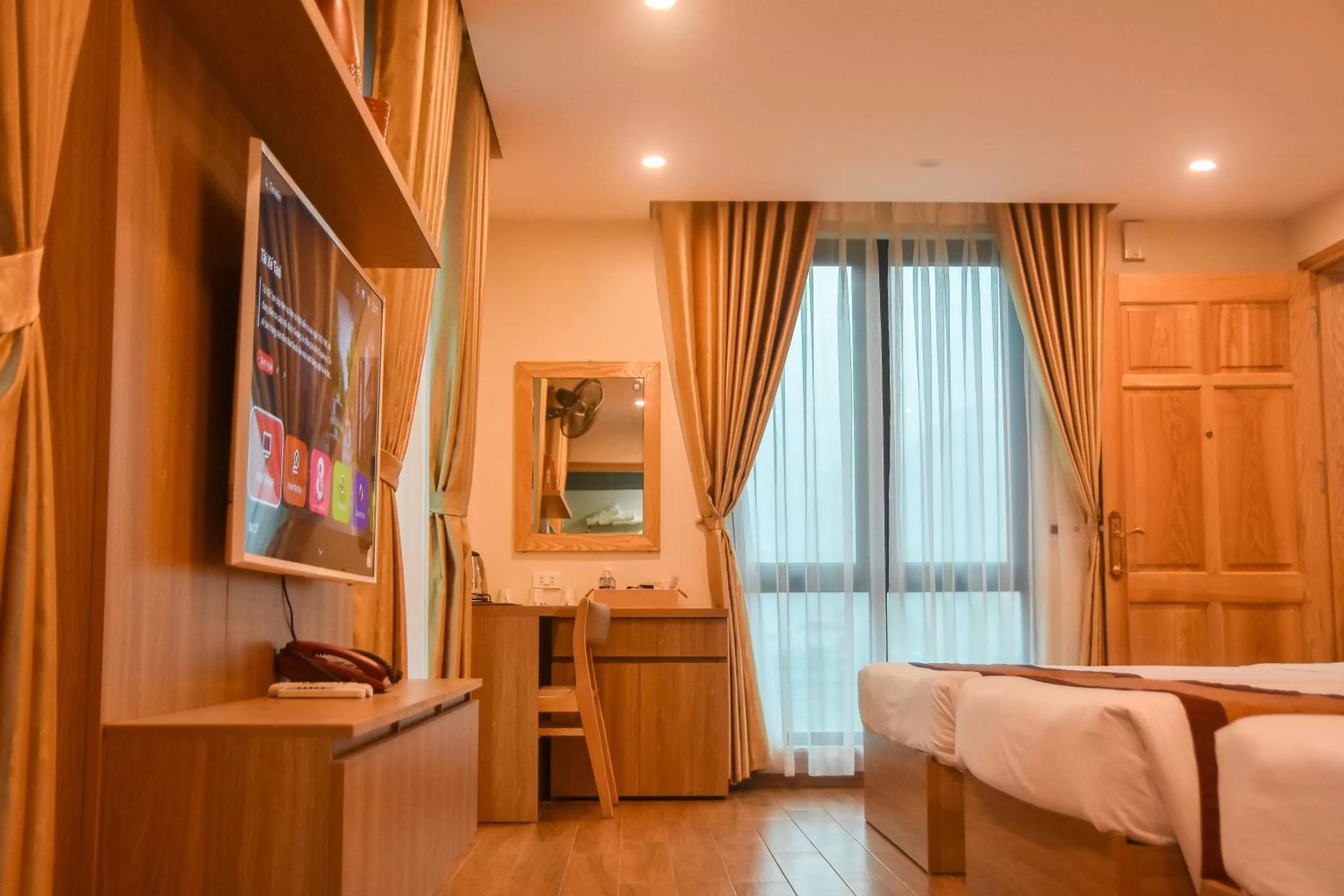 TV and multimedia, Bed in Cozynibi Hotel