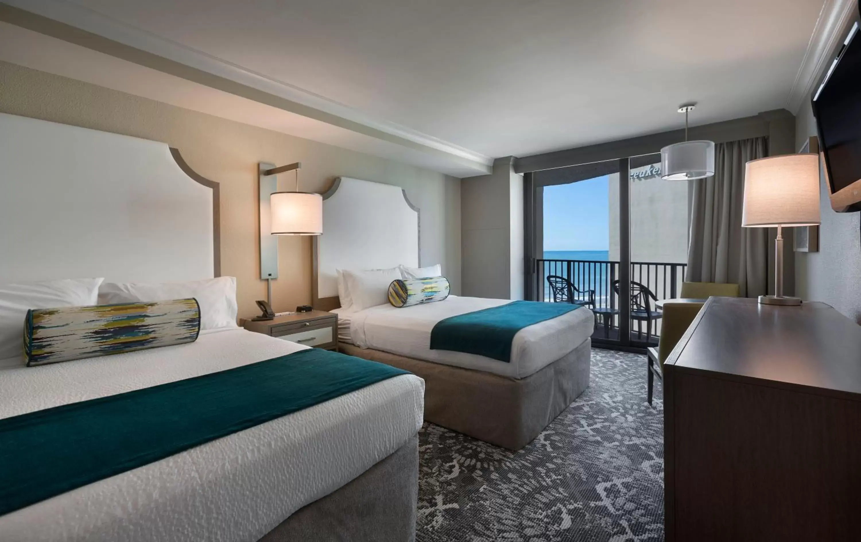 Bed in Breakers Resort Hotel