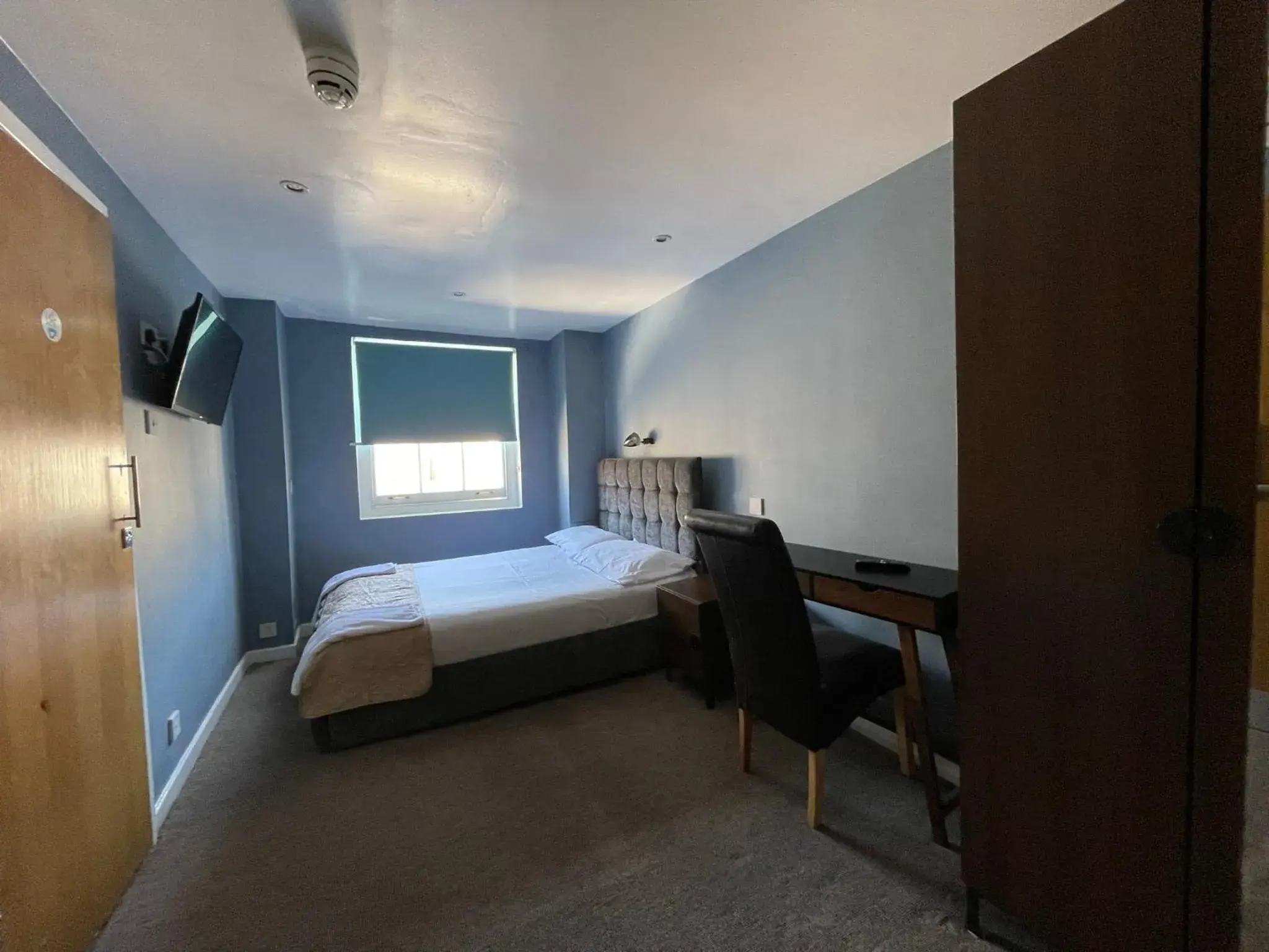 Bedroom in The Somerset Hotel