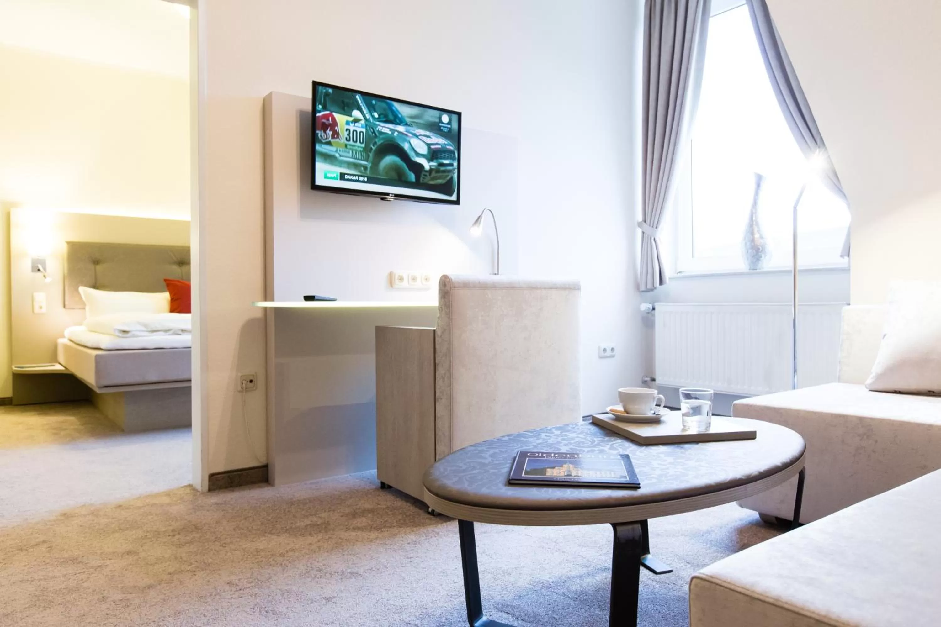 TV and multimedia, Bed in Hermes Hotel Oldenburg