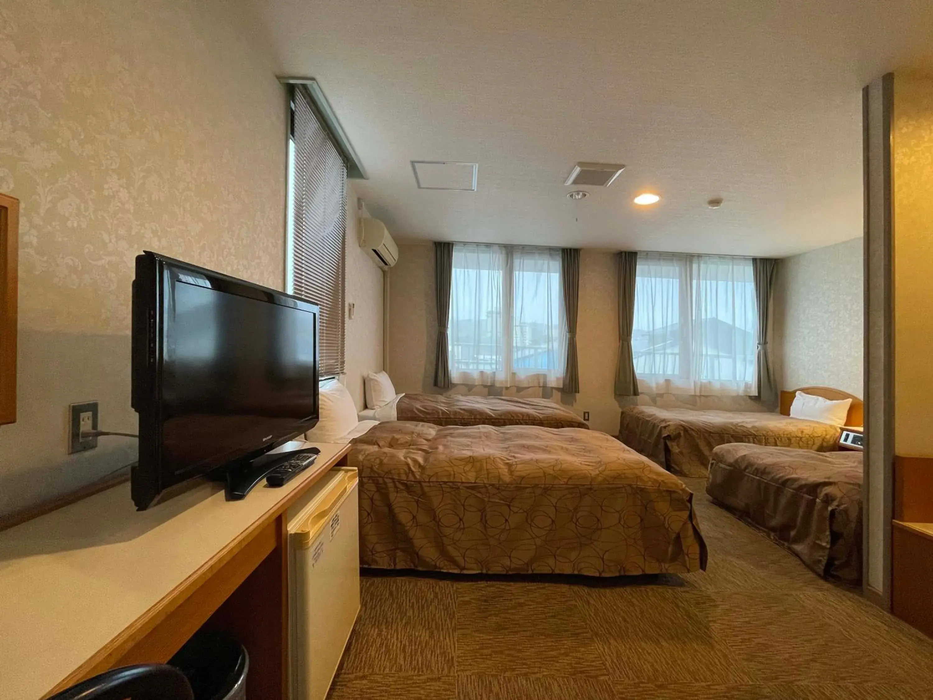 TV and multimedia, TV/Entertainment Center in Hotel Ginsui