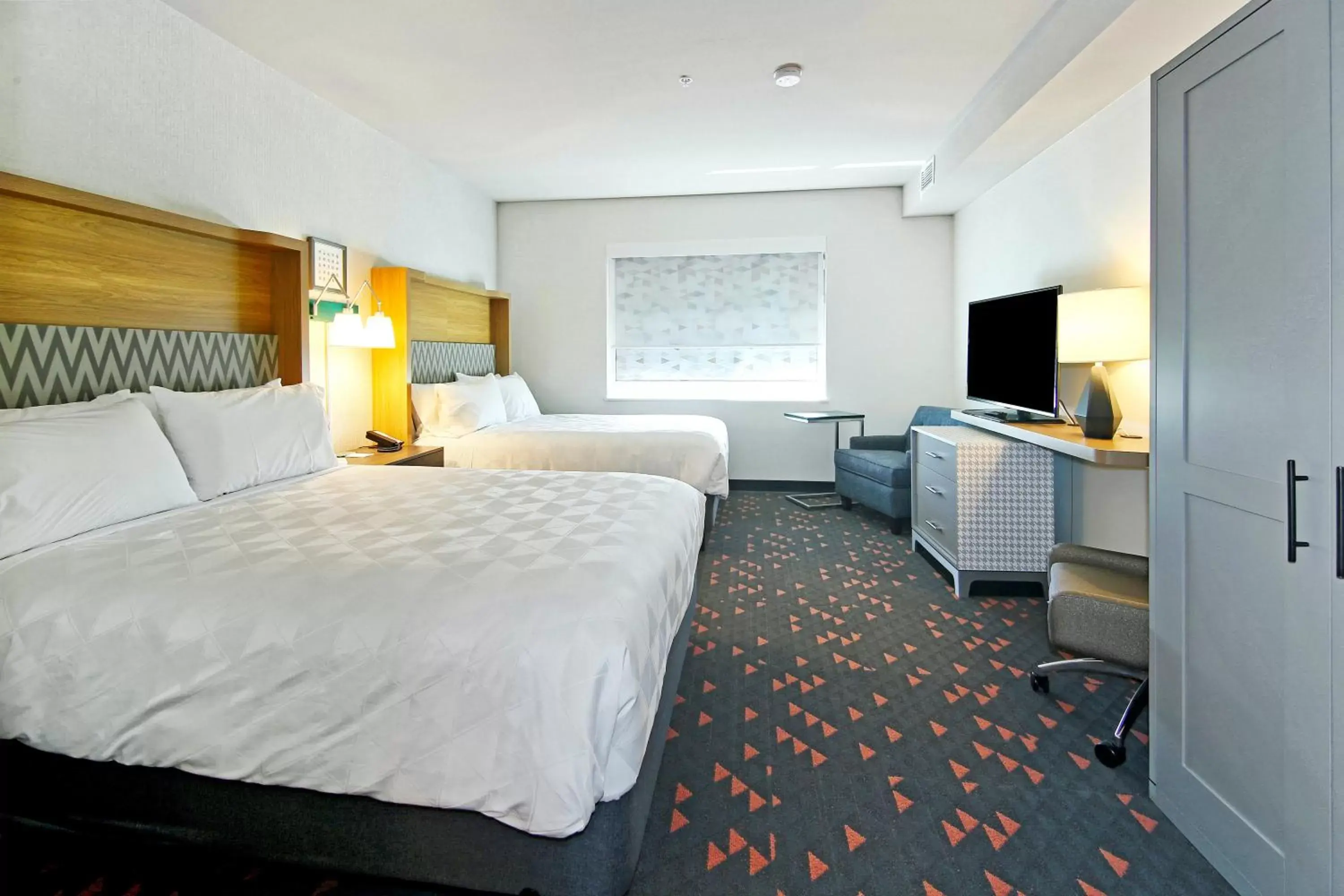 Photo of the whole room, Bed in Holiday Inn Hotel & Suites - Calgary Airport North, an IHG Hotel