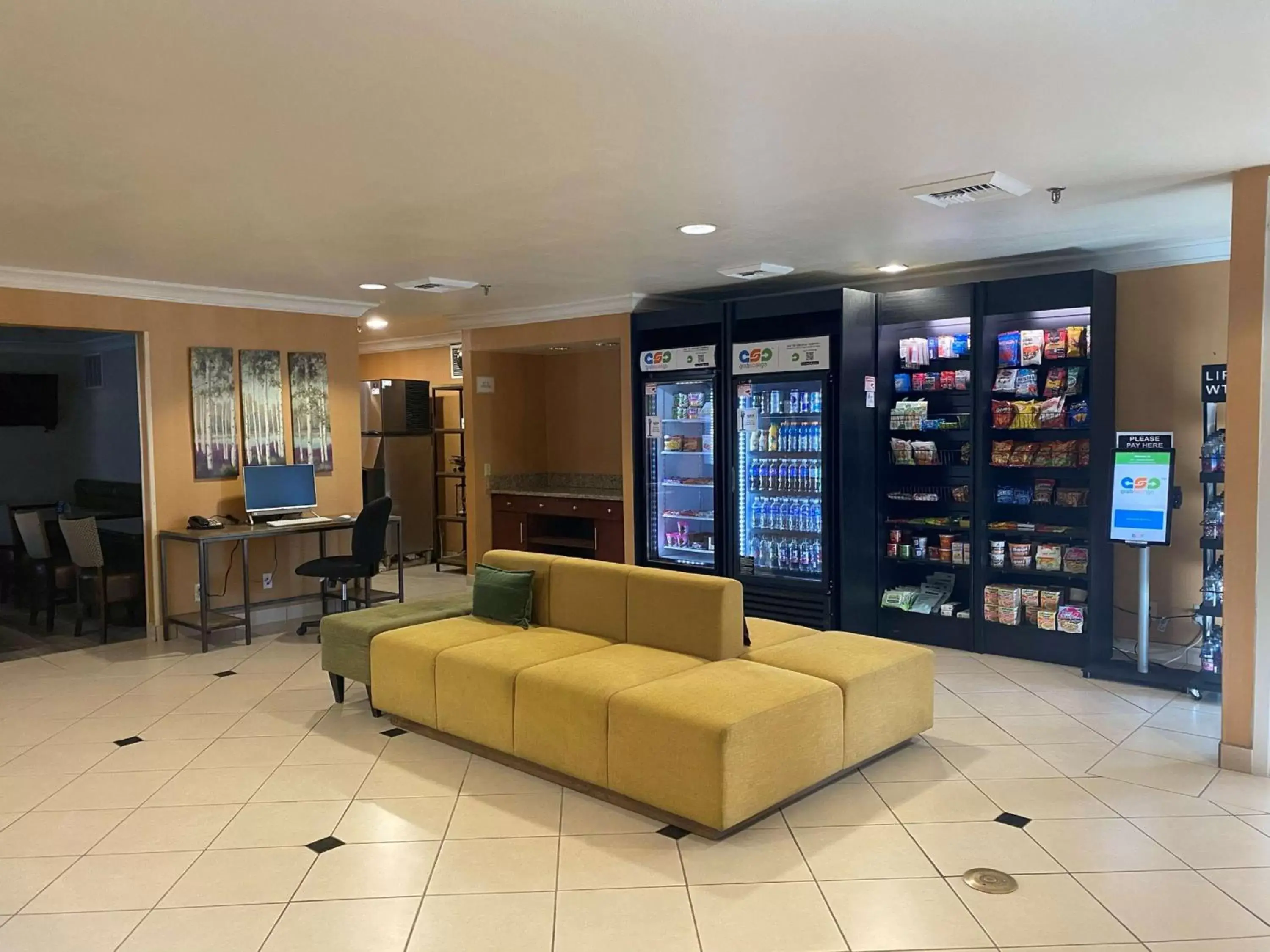 Lobby or reception in SureStay Hotel by Best Western Ontario Airport