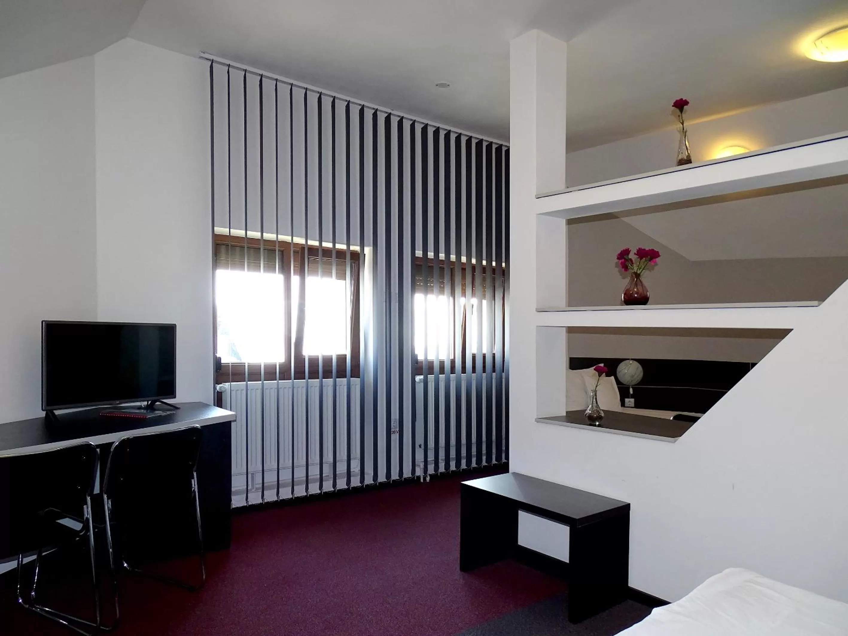 Photo of the whole room, TV/Entertainment Center in Prince Hotel