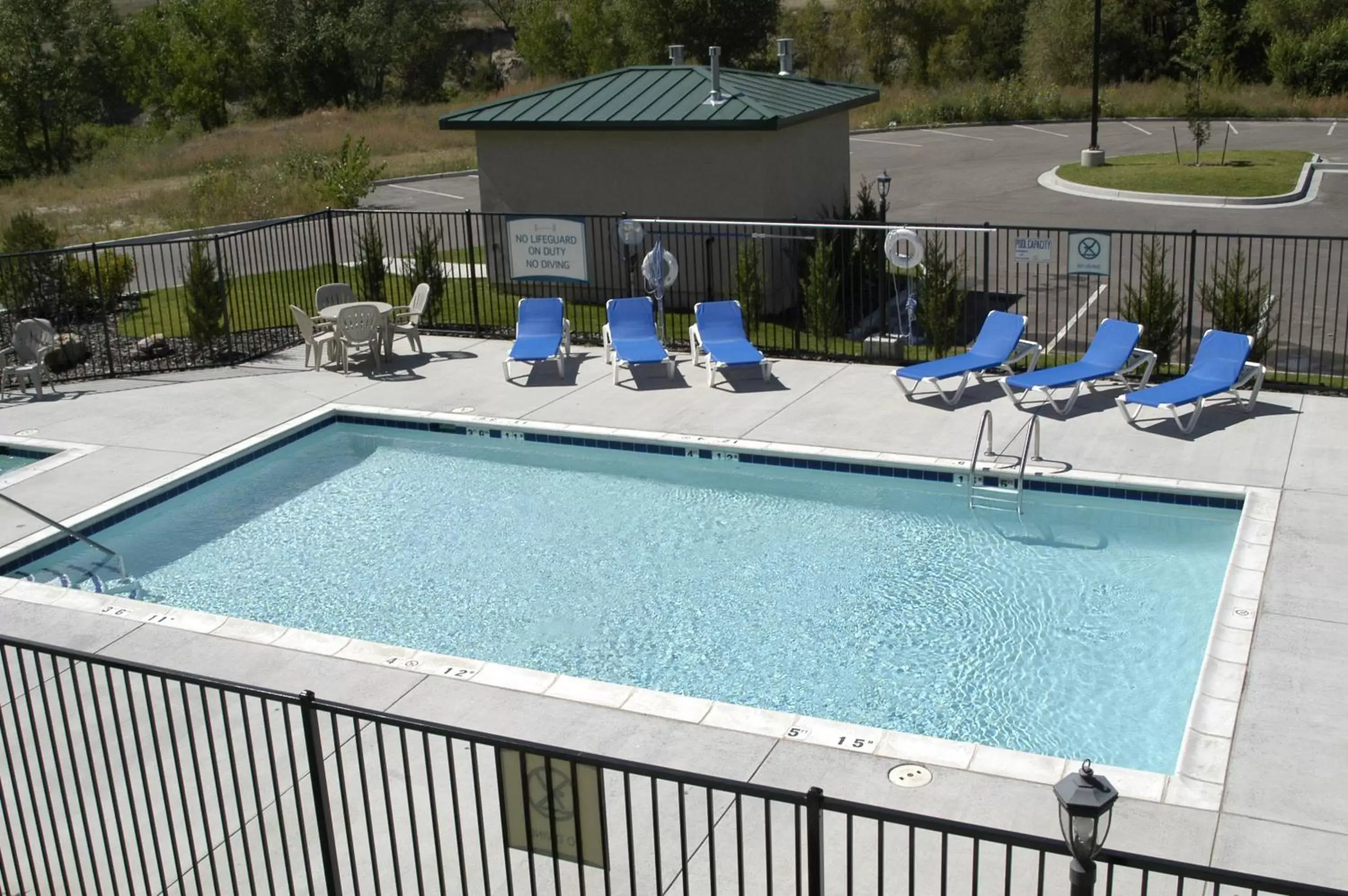 Swimming pool, Pool View in Staybridge Suites Colorado Springs North, an IHG Hotel