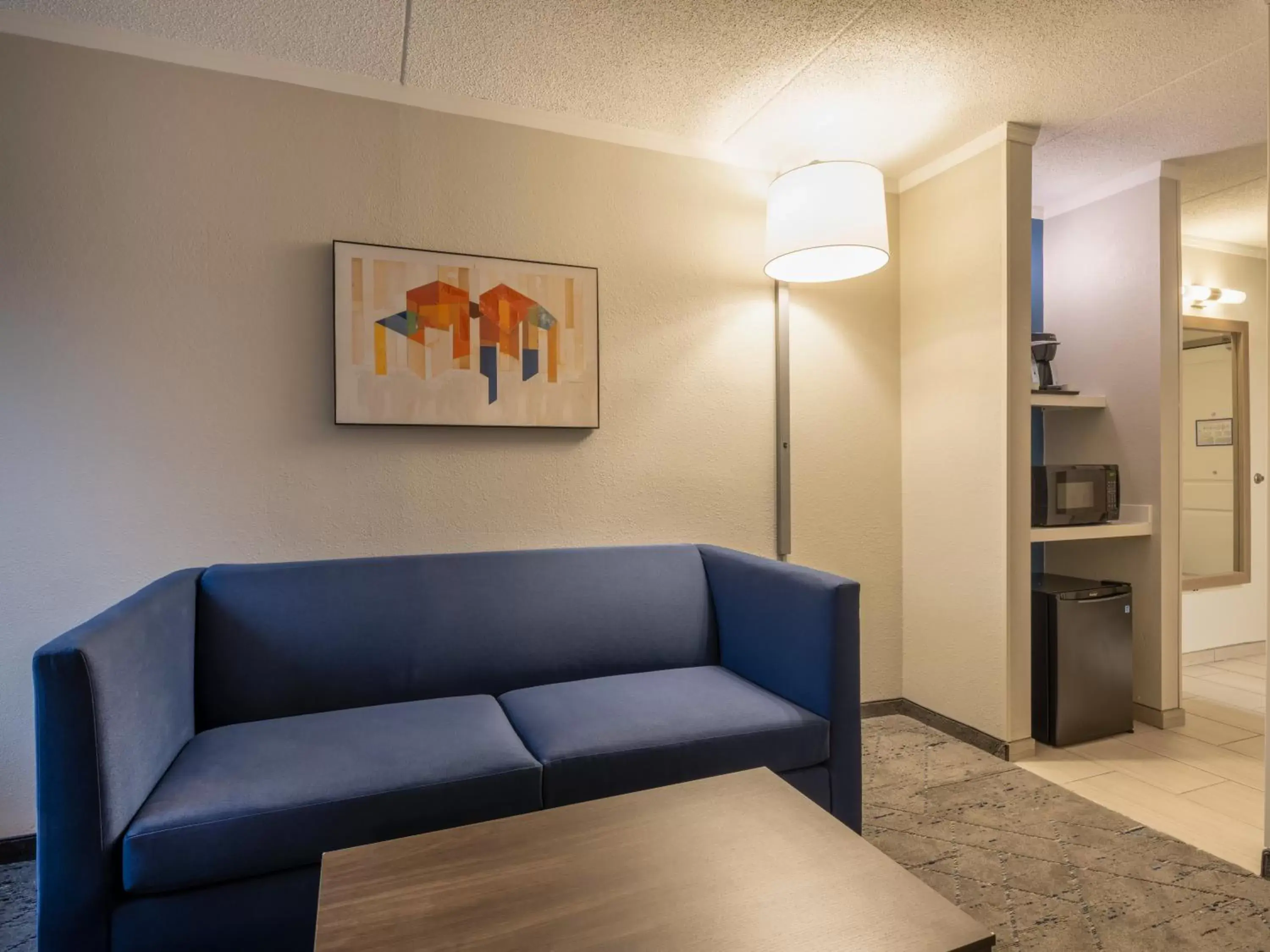 Living room, Seating Area in Holiday Inn Express & Suites Greensboro - I-40 atWendover, an IHG Hotel