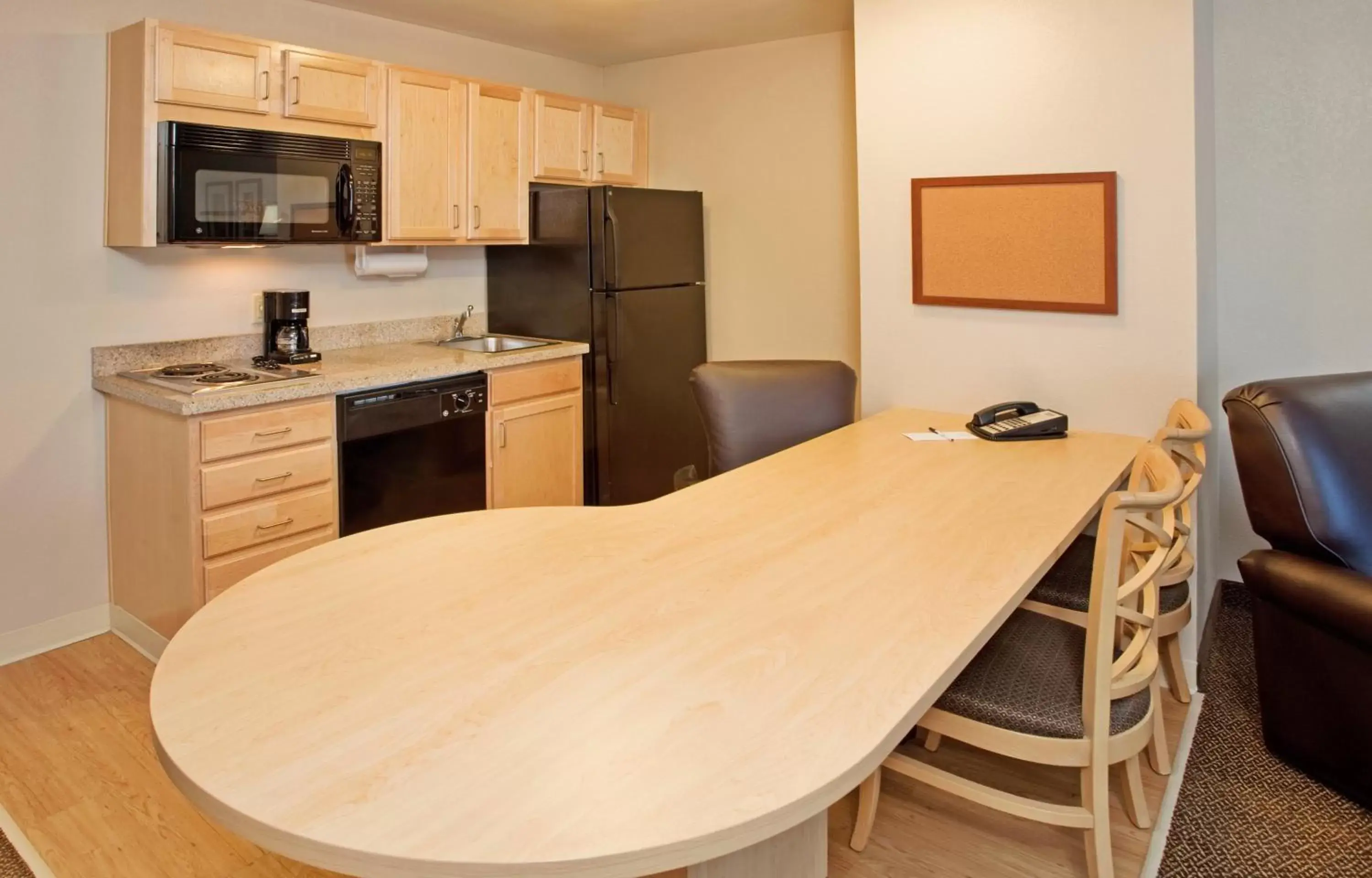 Photo of the whole room, Kitchen/Kitchenette in Candlewood Suites Junction City - Ft. Riley, an IHG Hotel