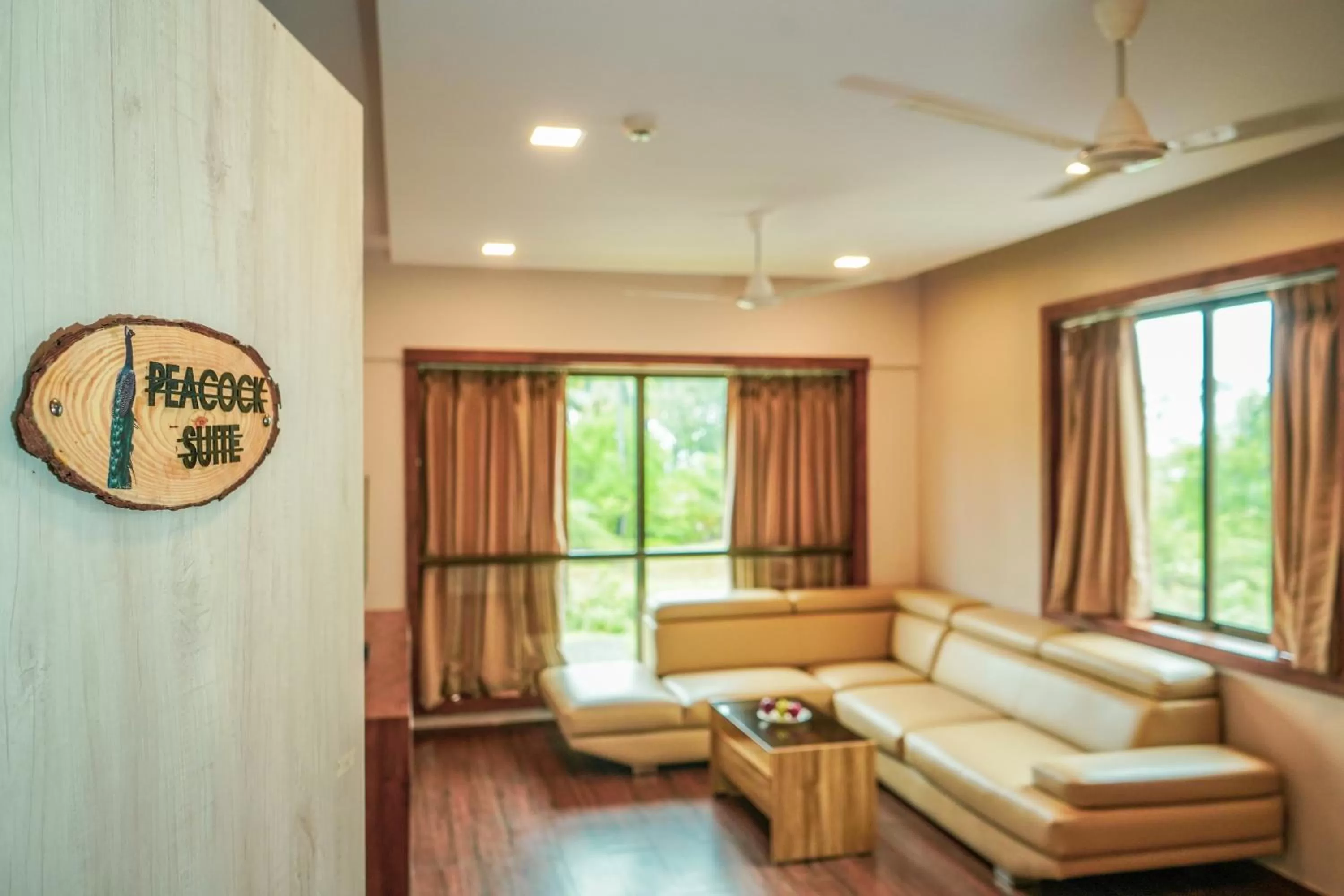 Seating area, Bed in Nest Beacon Resort Daman