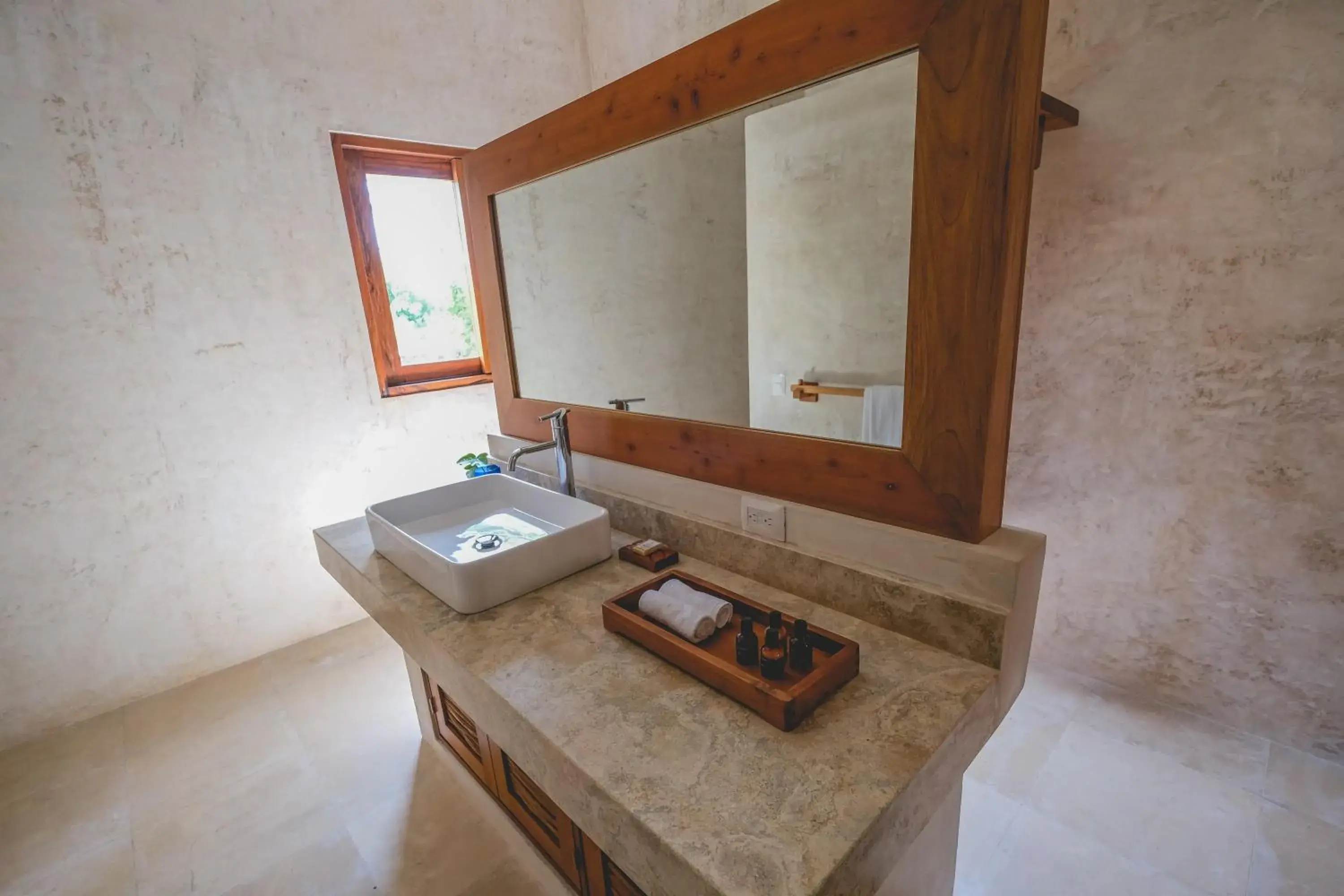 Bathroom in Wakax Hacienda - Cenote & Boutique Hotel