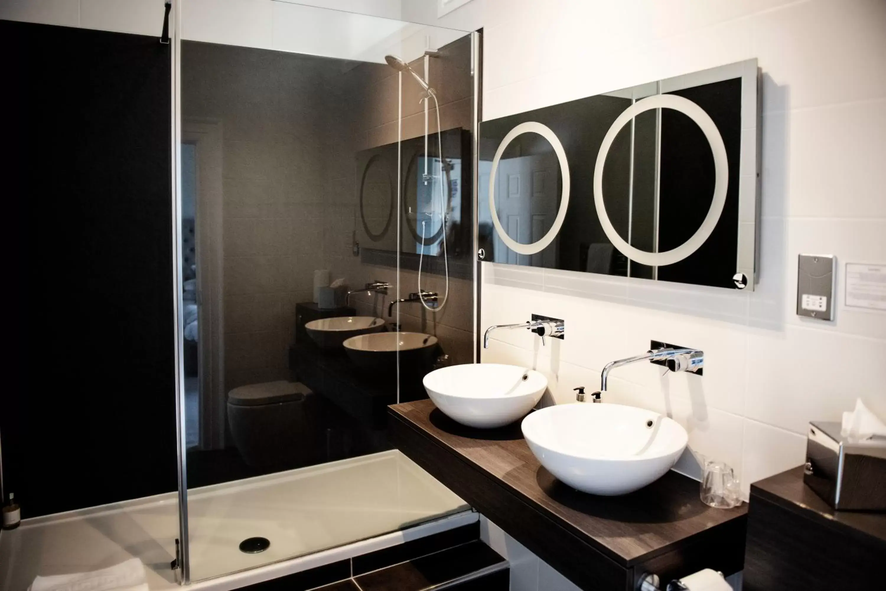 Bathroom in Roundthorn Country House & Luxury Apartments