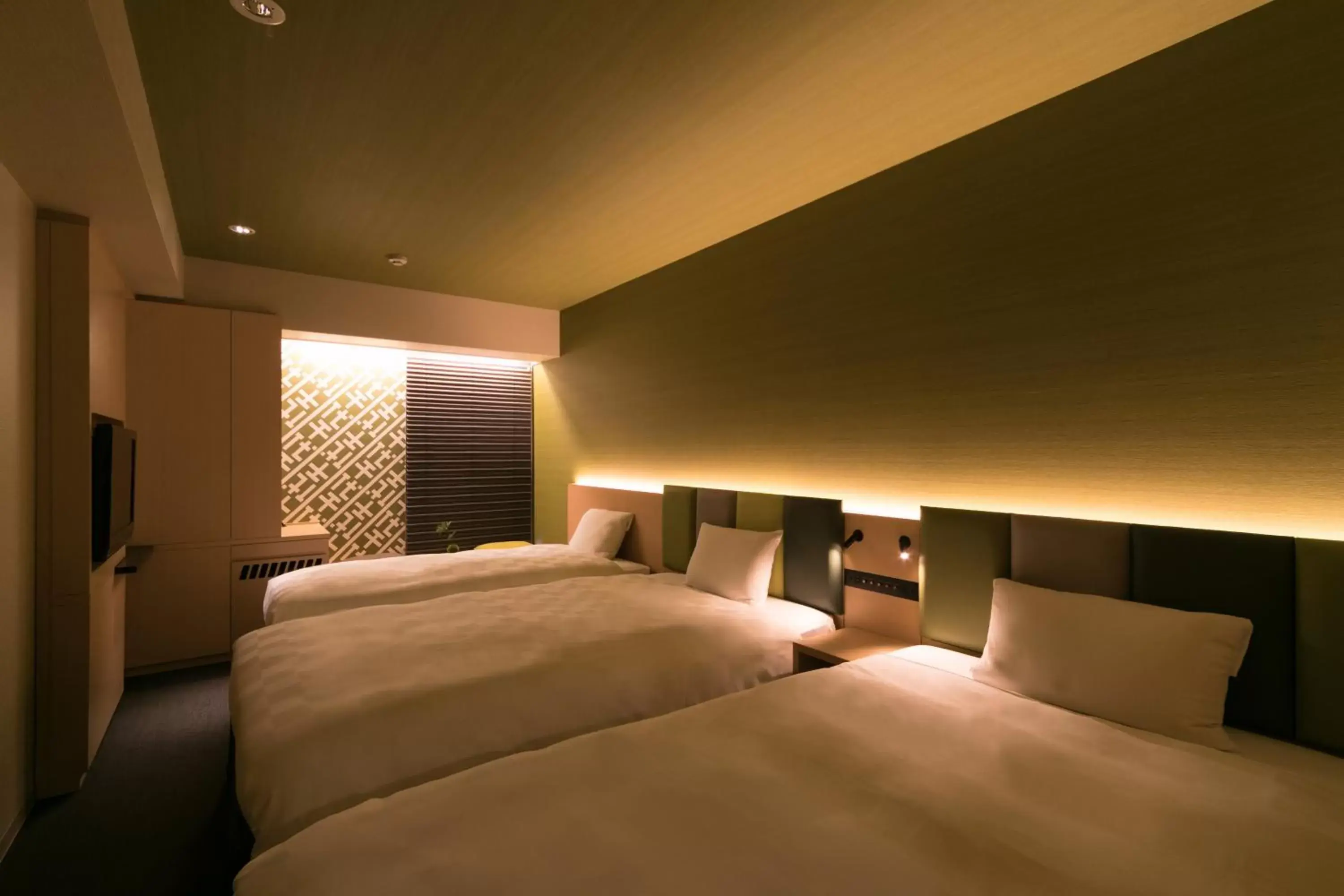 Bed in Hakata Tokyu REI Hotel