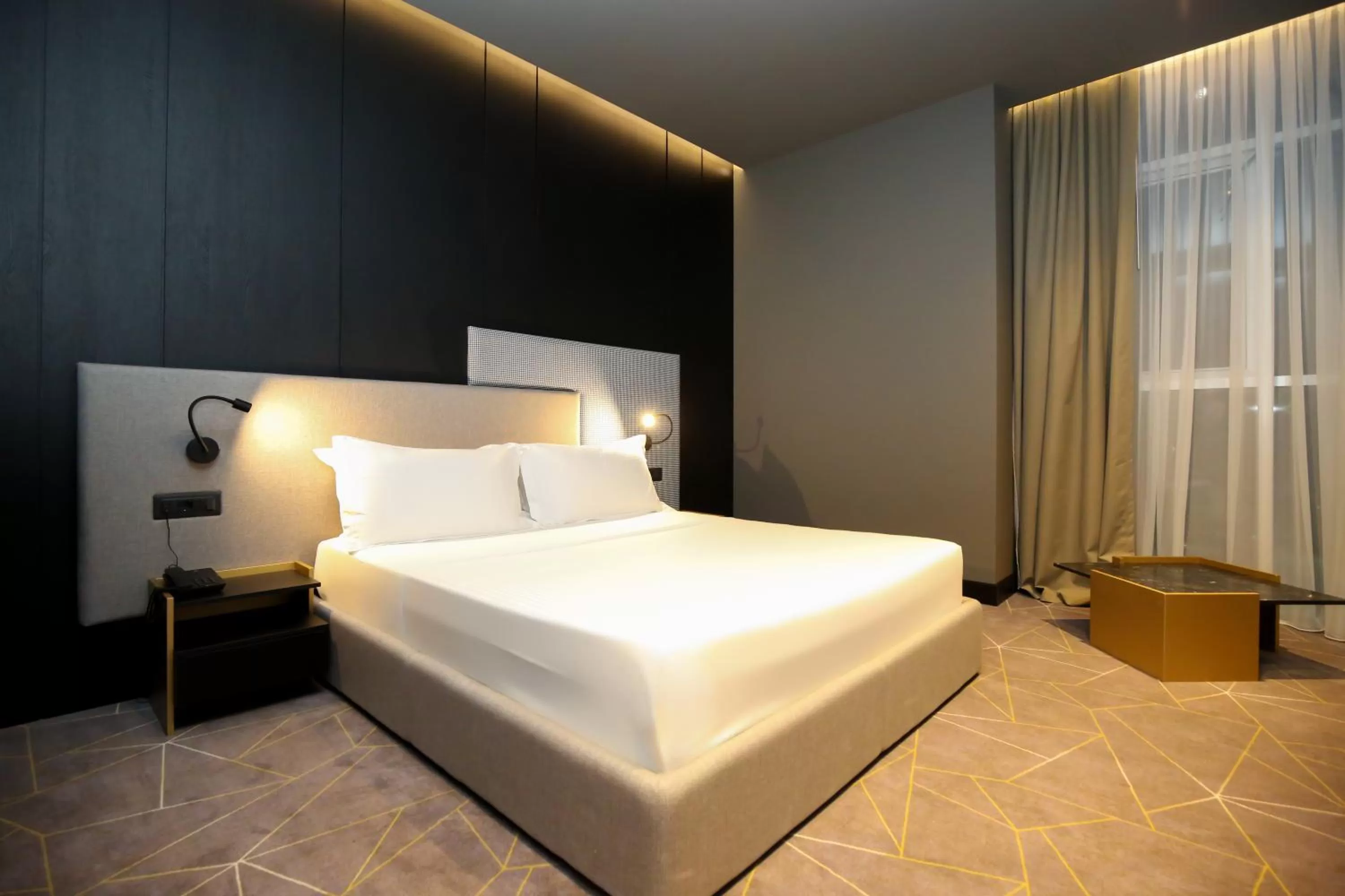 Bed in The Central View Boutique Hotel