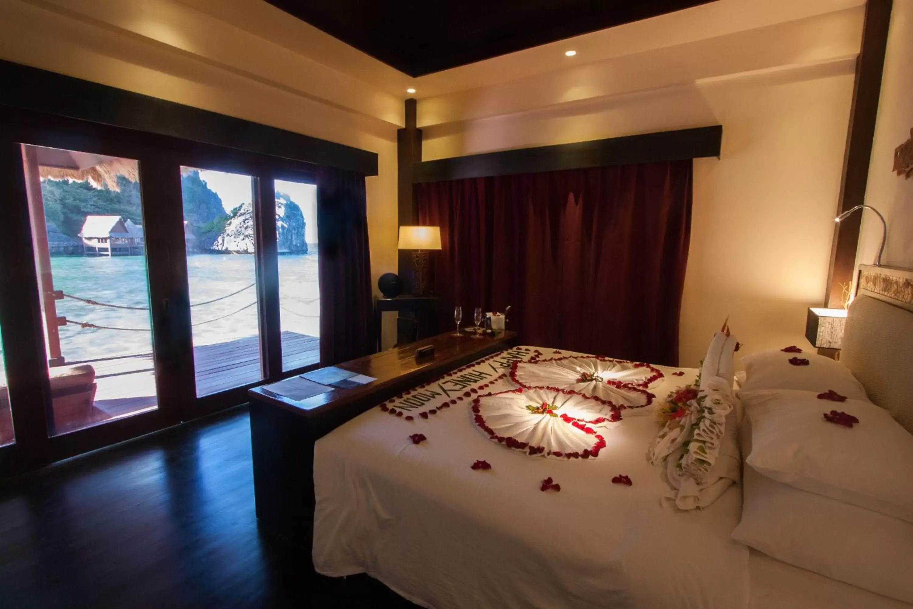 Bed in Cauayan Island Resort and Spa Bed in Cauayan Island Resort and Spa