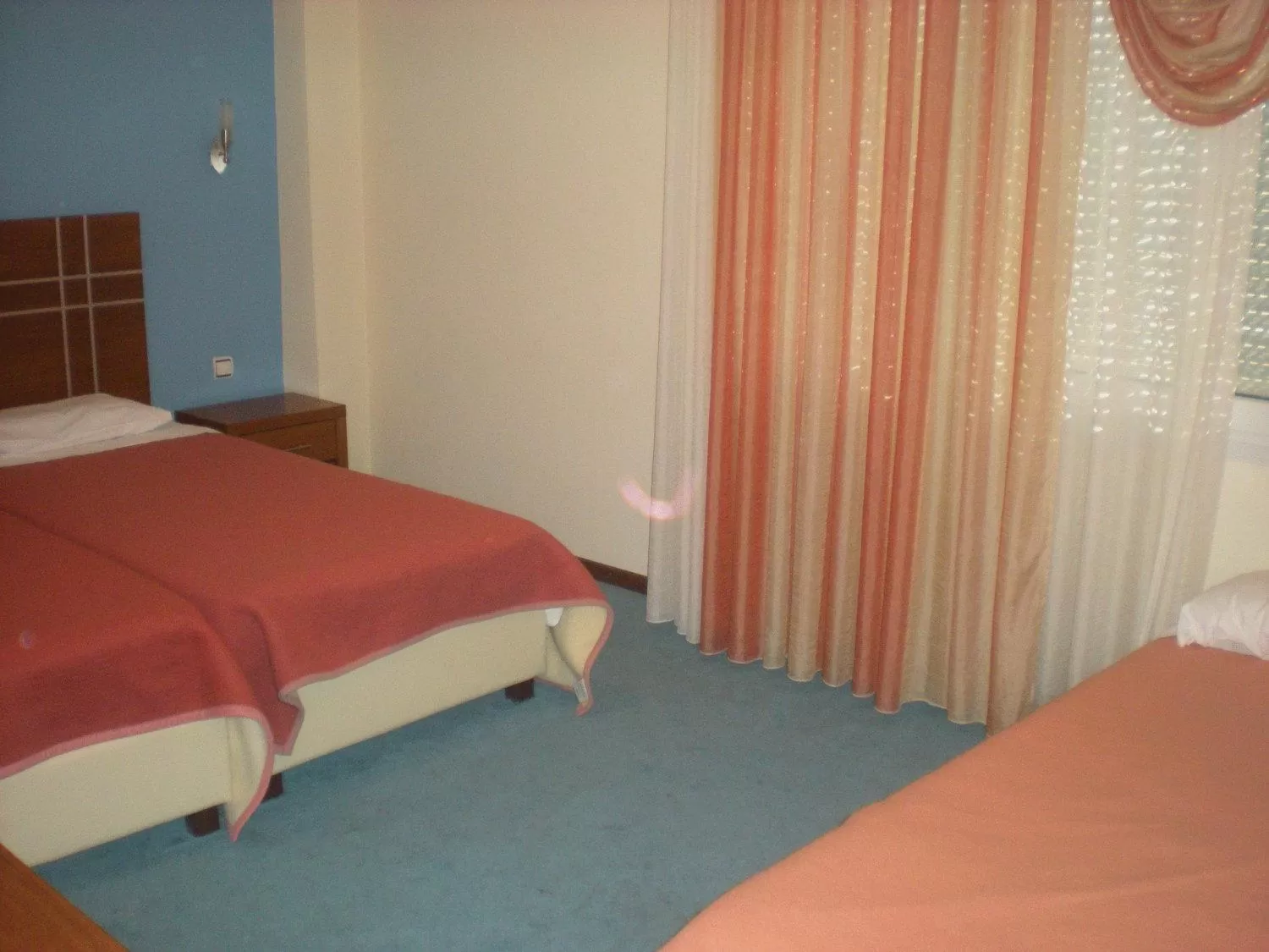 Photo of the whole room, Bed in Achillion Palace