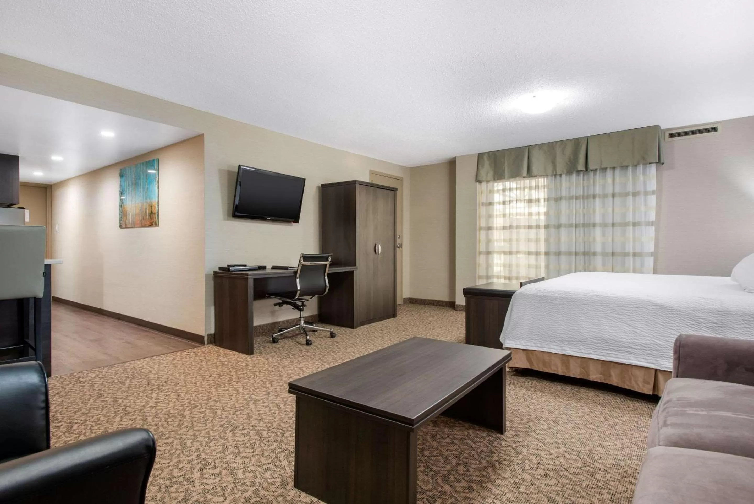 Photo of the whole room, Bed in Clarion Hotel & Suites