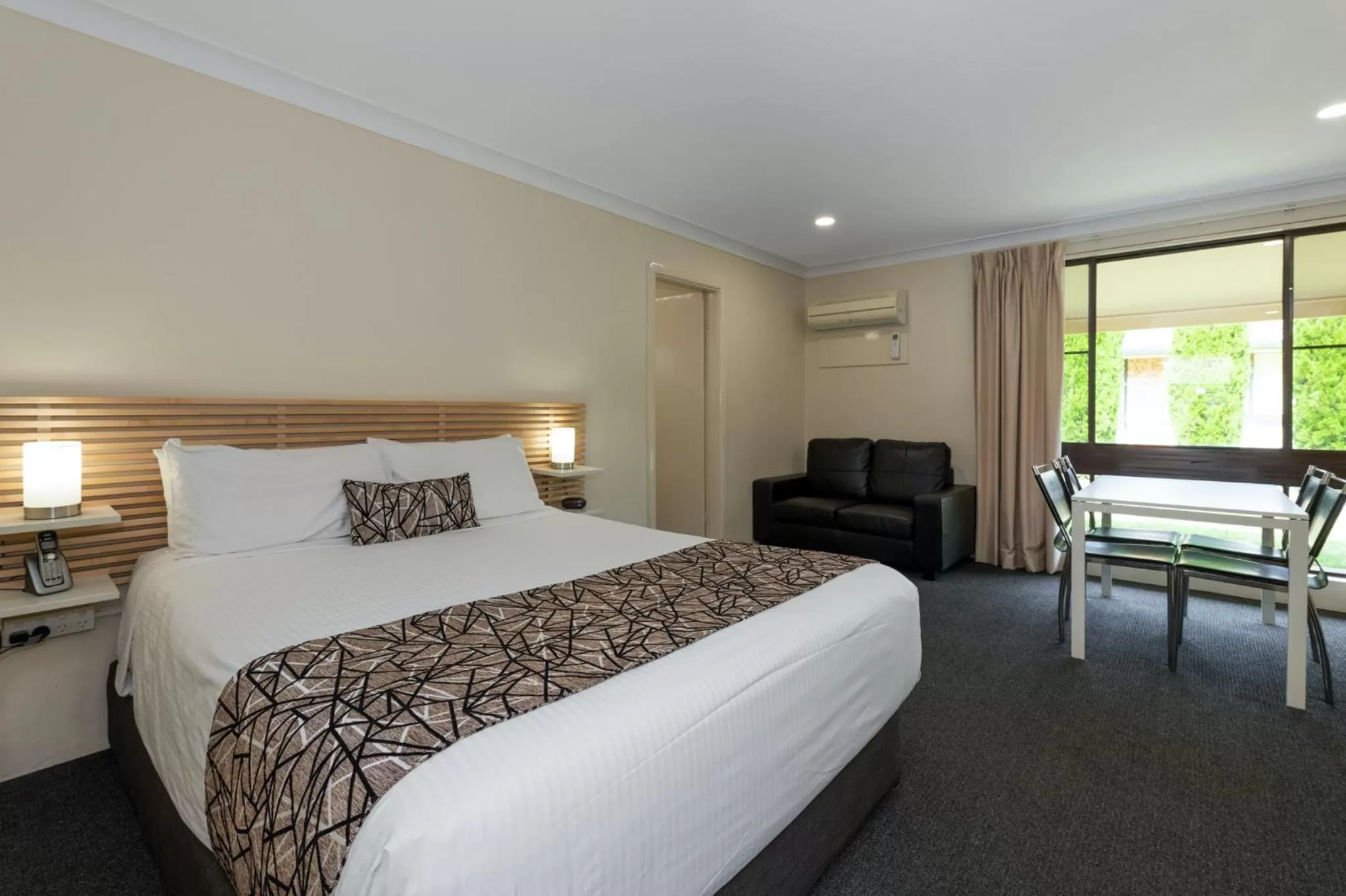 Bed in Zig Zag Motel & Apartments