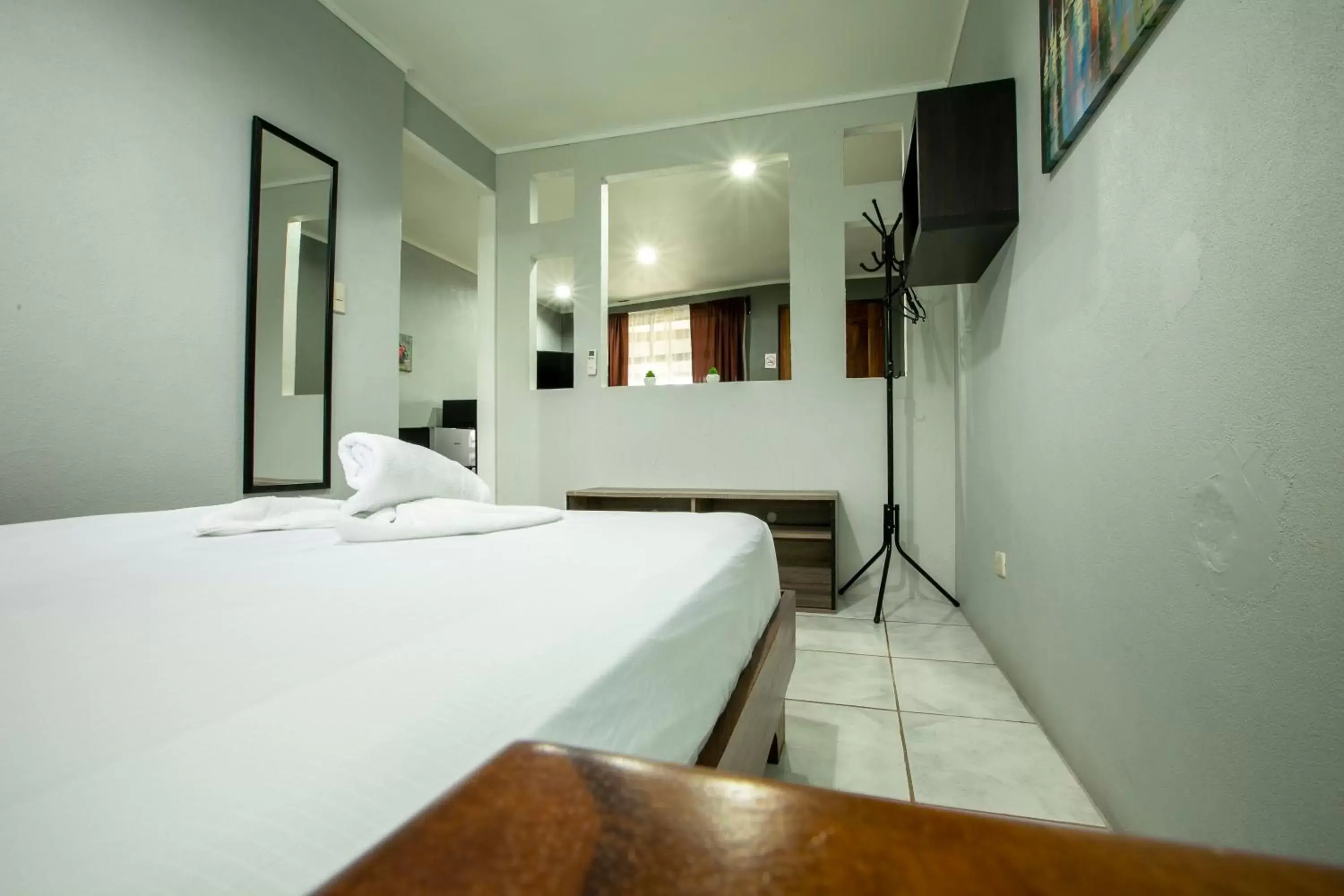 Bed in Coati Arenal Lodge