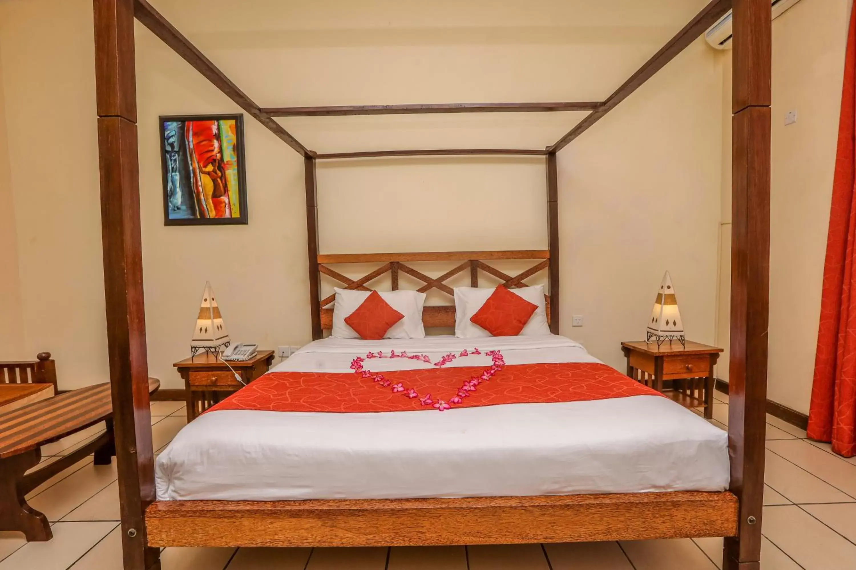 Bed in CityBlue Creekside Hotel & Suites