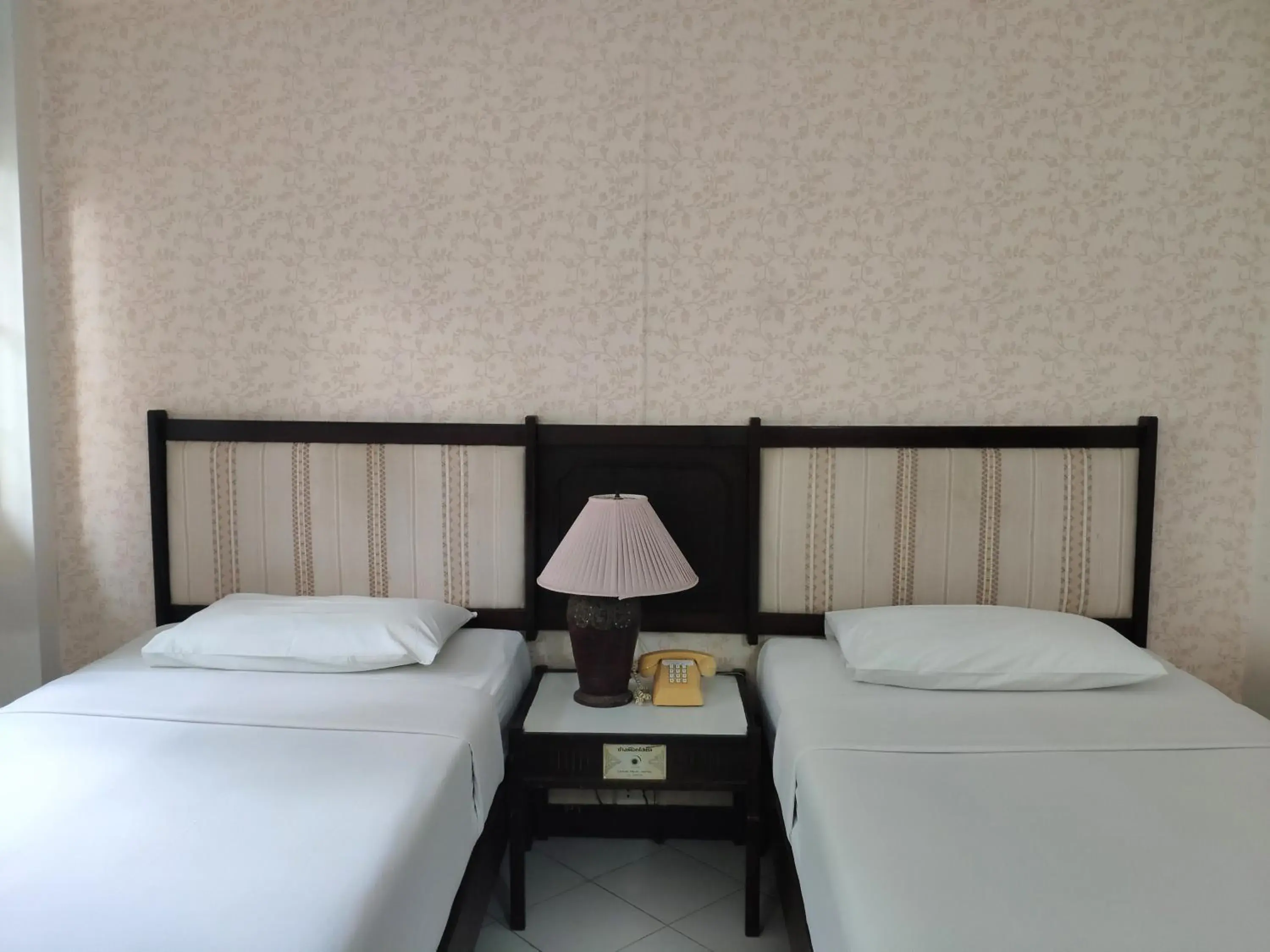 Bed in Changpuak Hotel