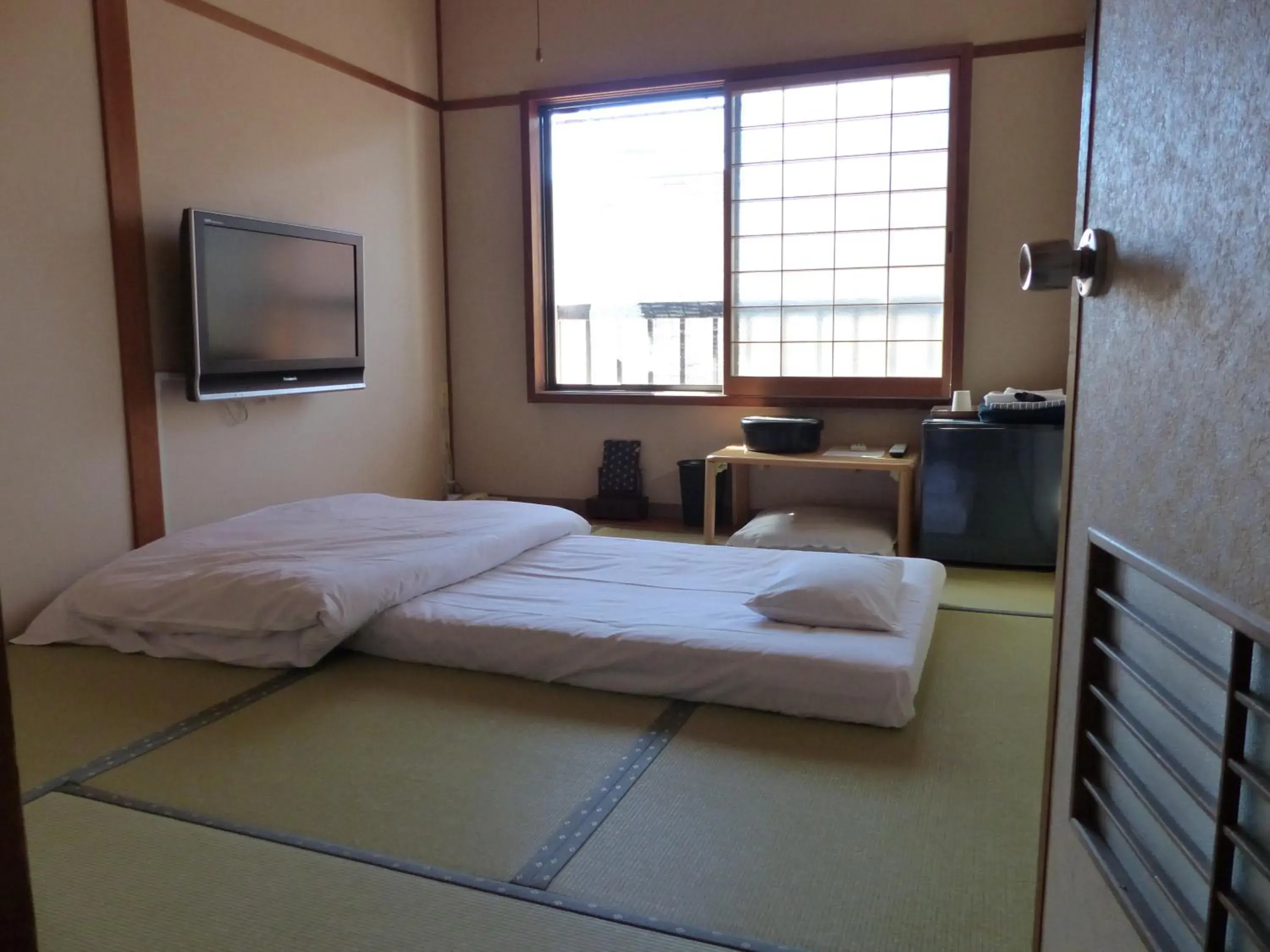 Bed in Minshuku Kuwataniya Ryokan