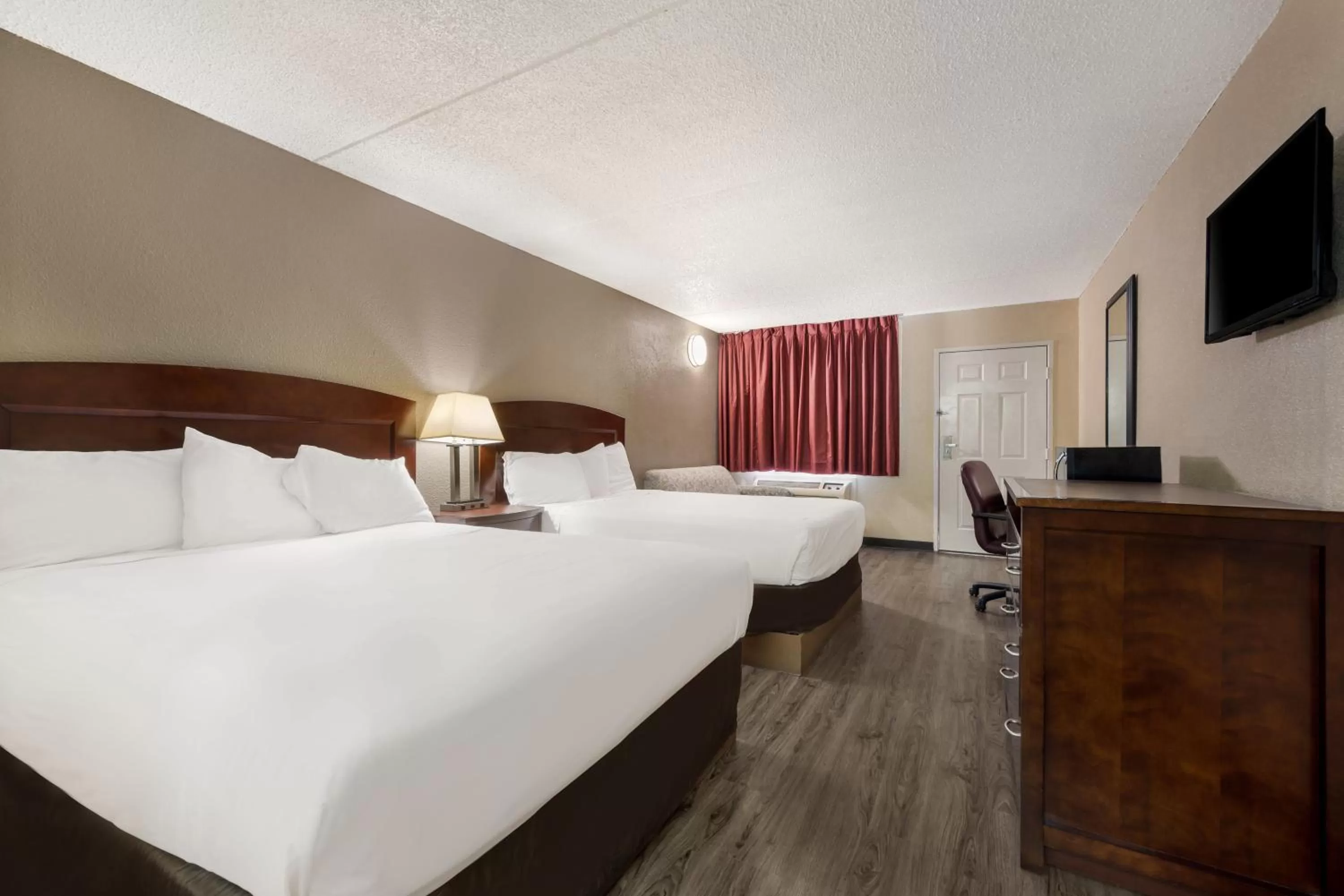 Bed in Knights Inn College Station