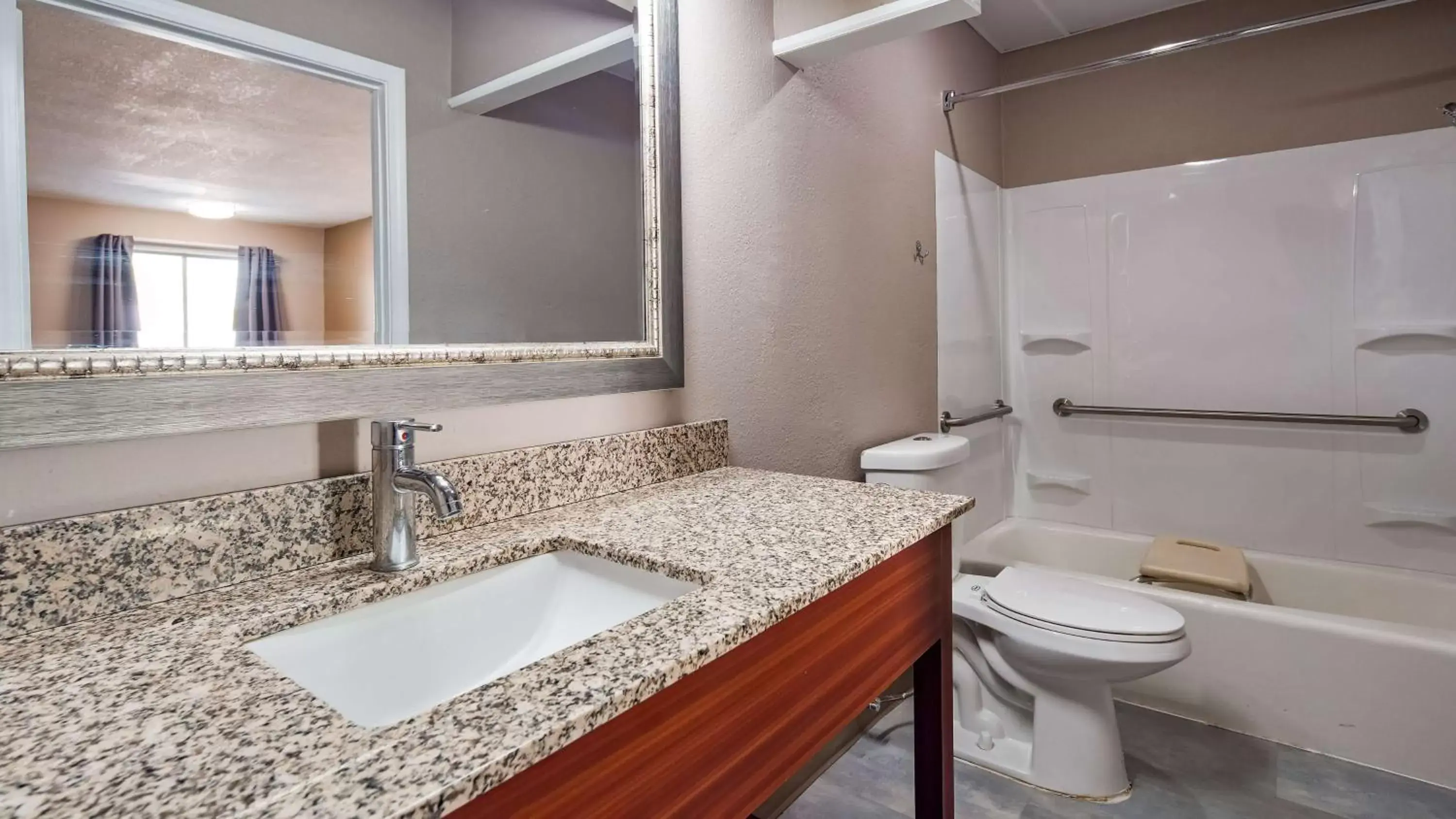 Bathroom in SureStay Hotel By Best Western Olathe