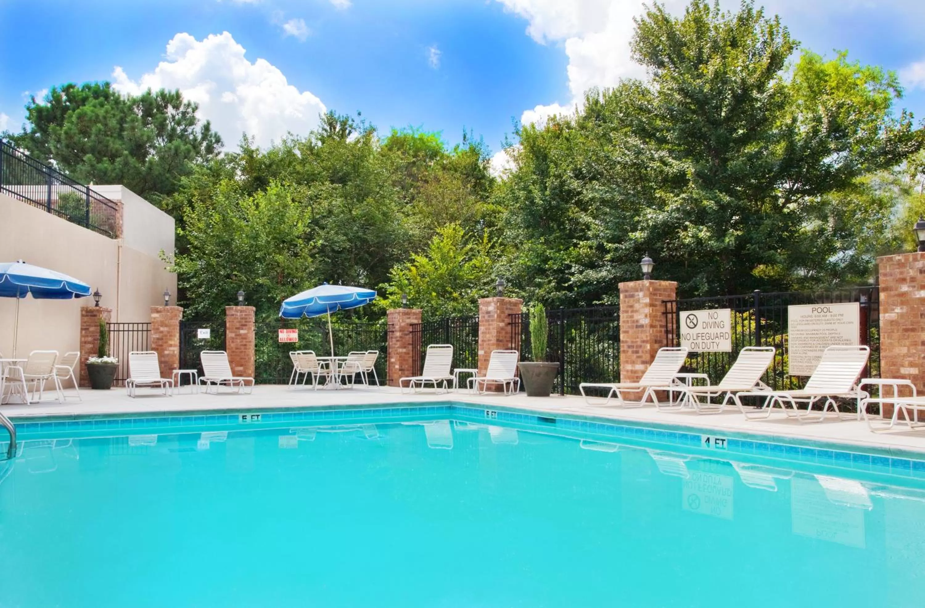 Swimming pool in Holiday Inn Express Hotel & Suites Austell Powder Springs by IHG