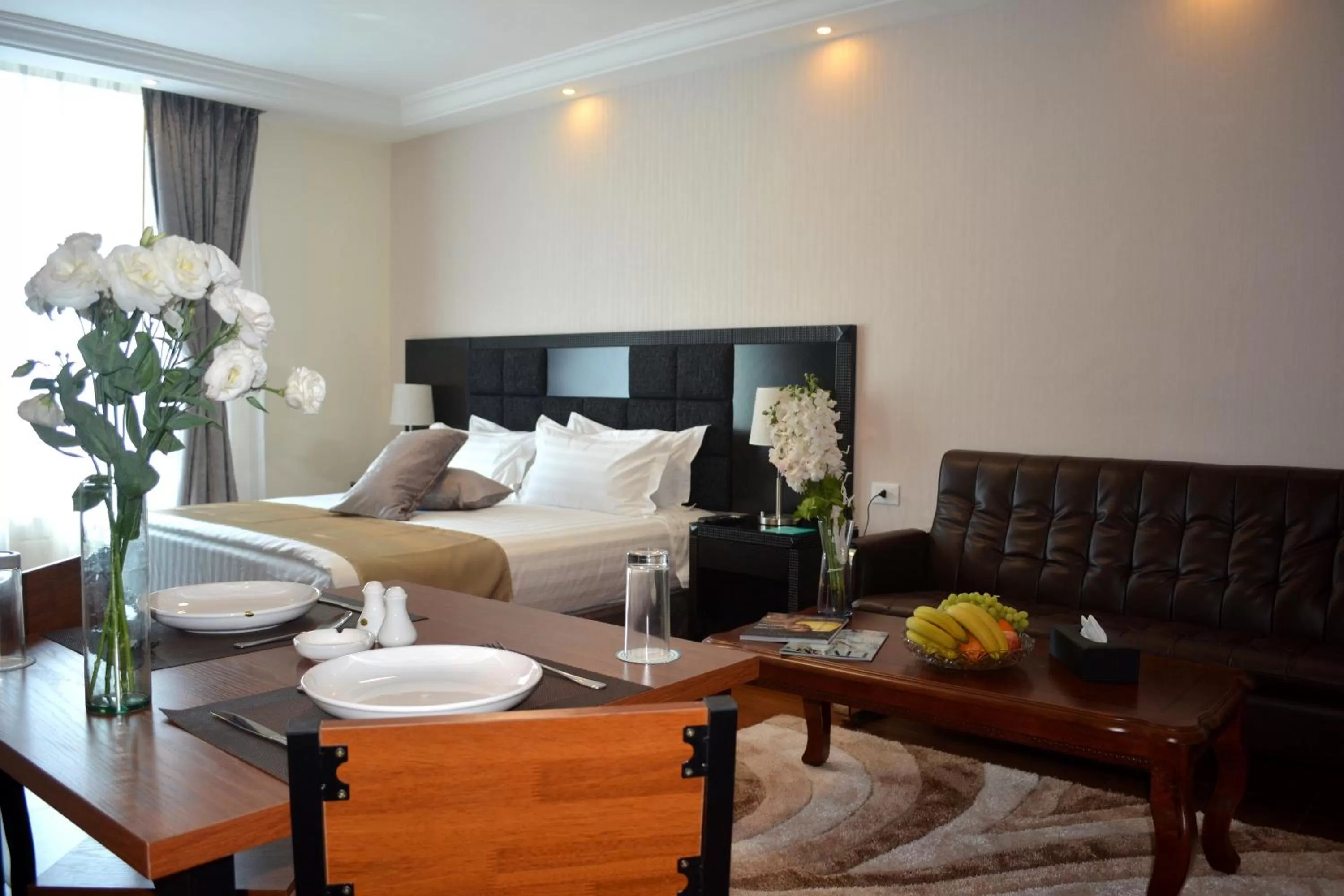 Photo of the whole room, Bed in Tilal Almadina Hotel & Suites