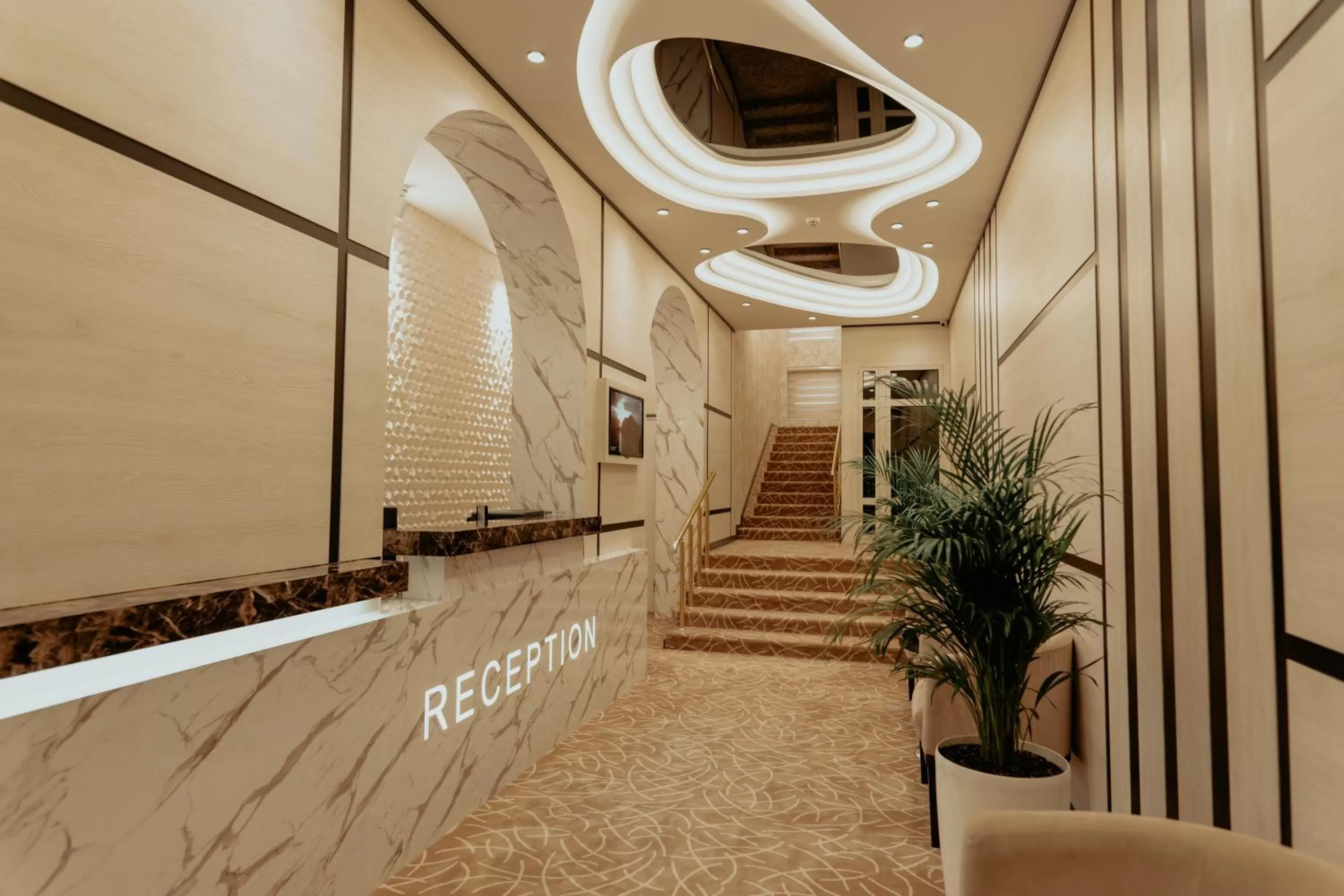 Lobby or reception in Astor Hotel