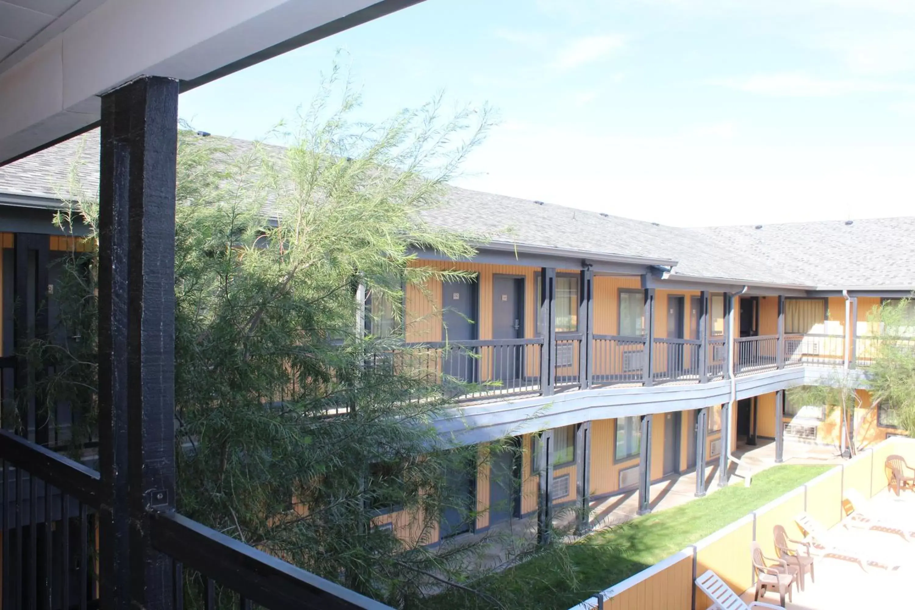 Pool view in The Executive Inn & Suites Pool view in The Executive Inn & Suites