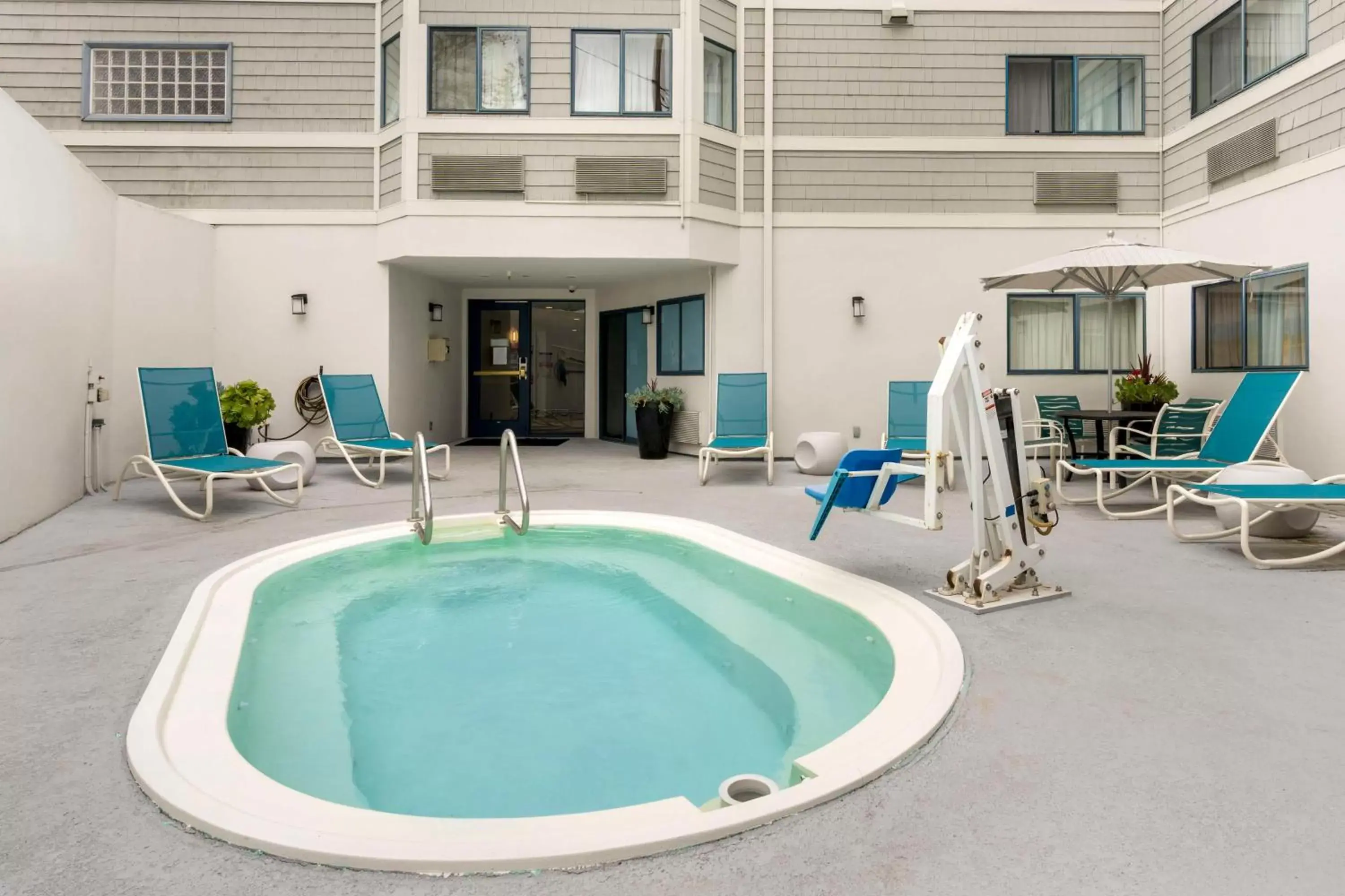 Patio, Swimming Pool in Best Western Plus All Suites Inn