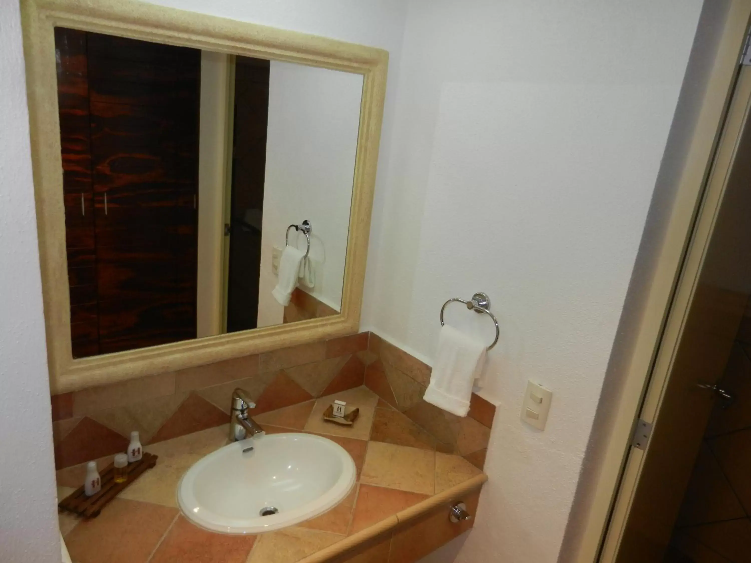 Bathroom in Hotel 9 Manantiales