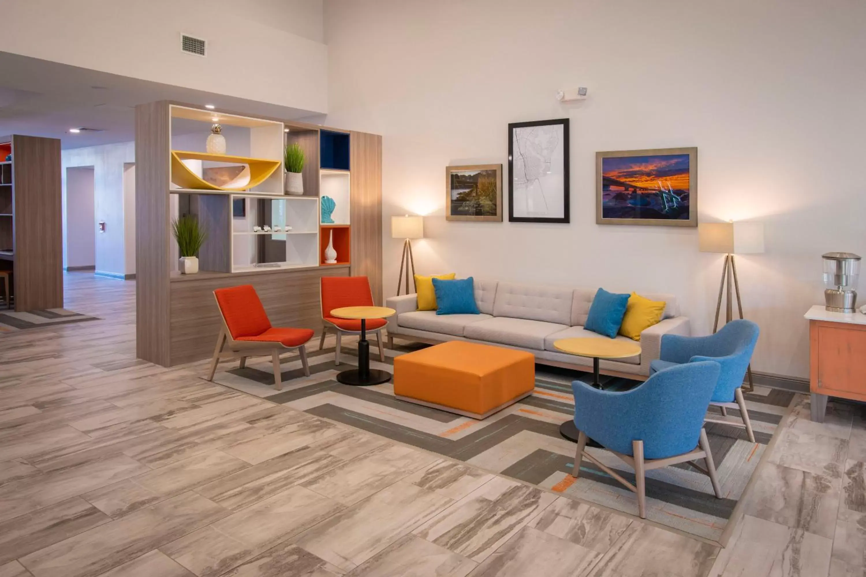 Property building, Seating Area in Holiday Inn Pensacola - University Area, an IHG Hotel