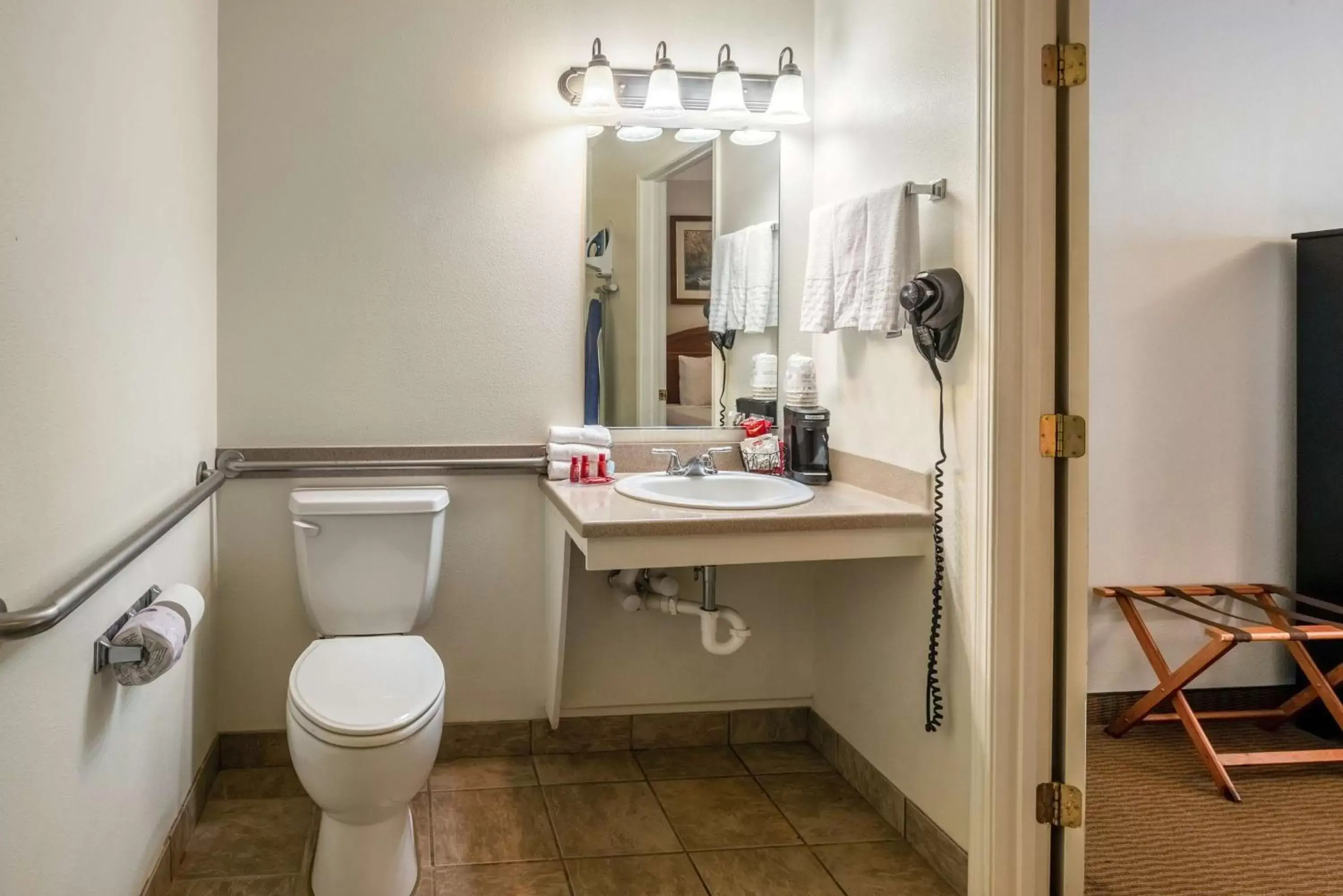 Bathroom in SureStay Hotel by Best Western Leesville