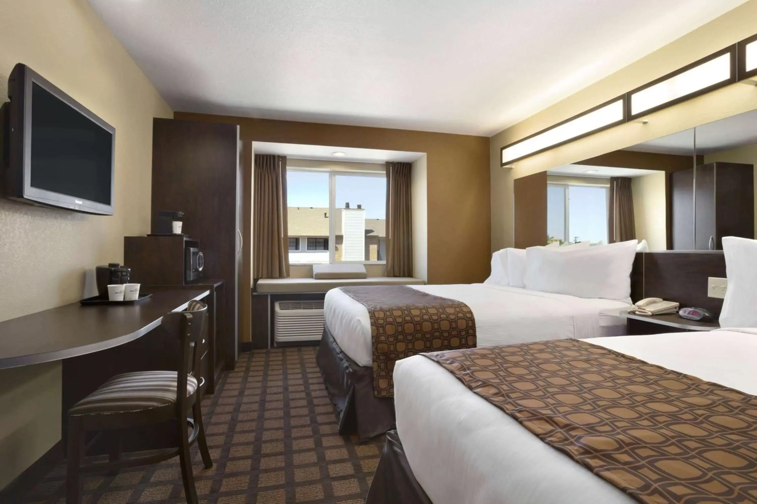 Photo of the whole room, Bed in Microtel Inn & Suites by Wyndham Odessa TX