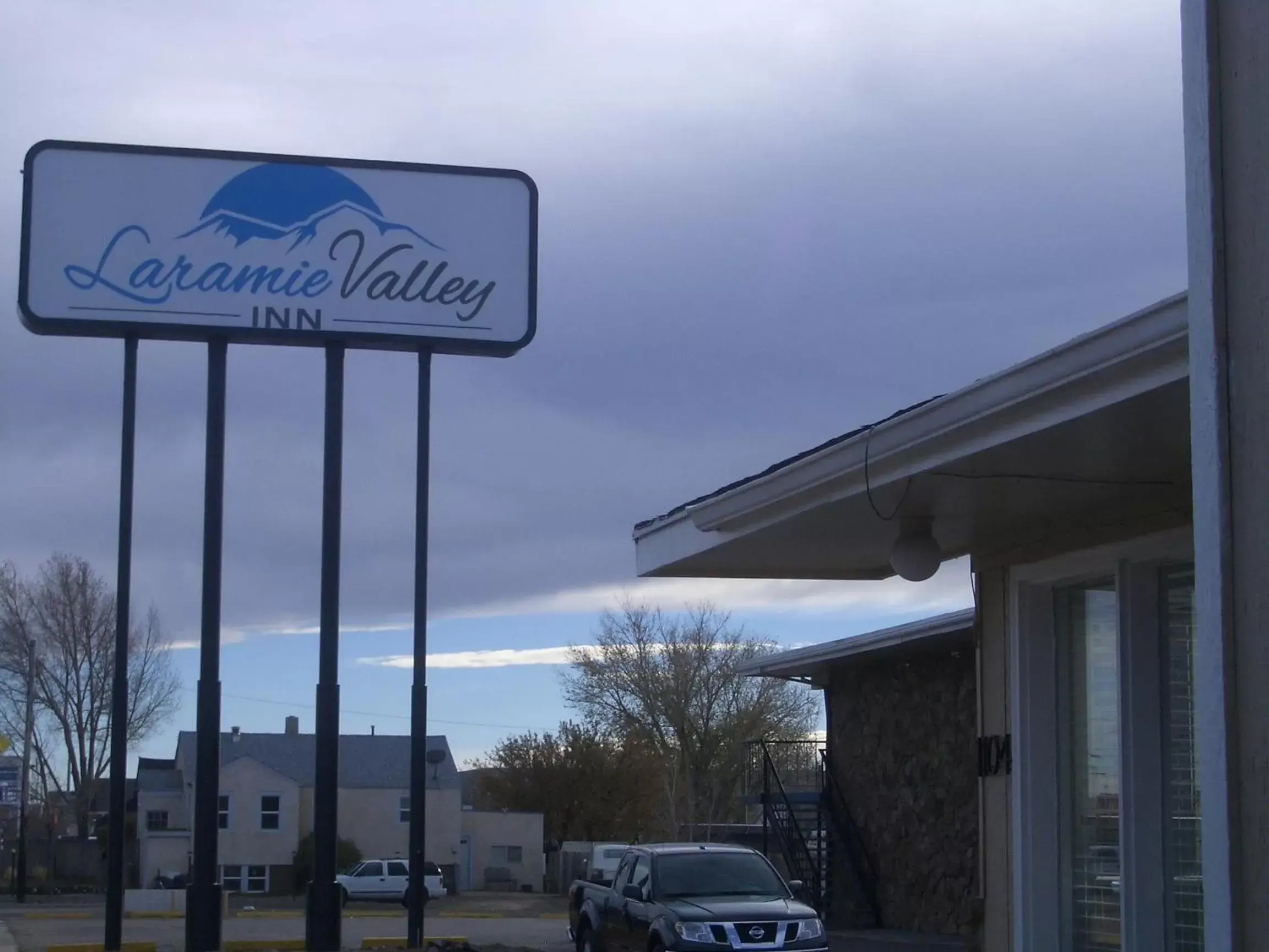 Property logo or sign in Laramie Valley Inn