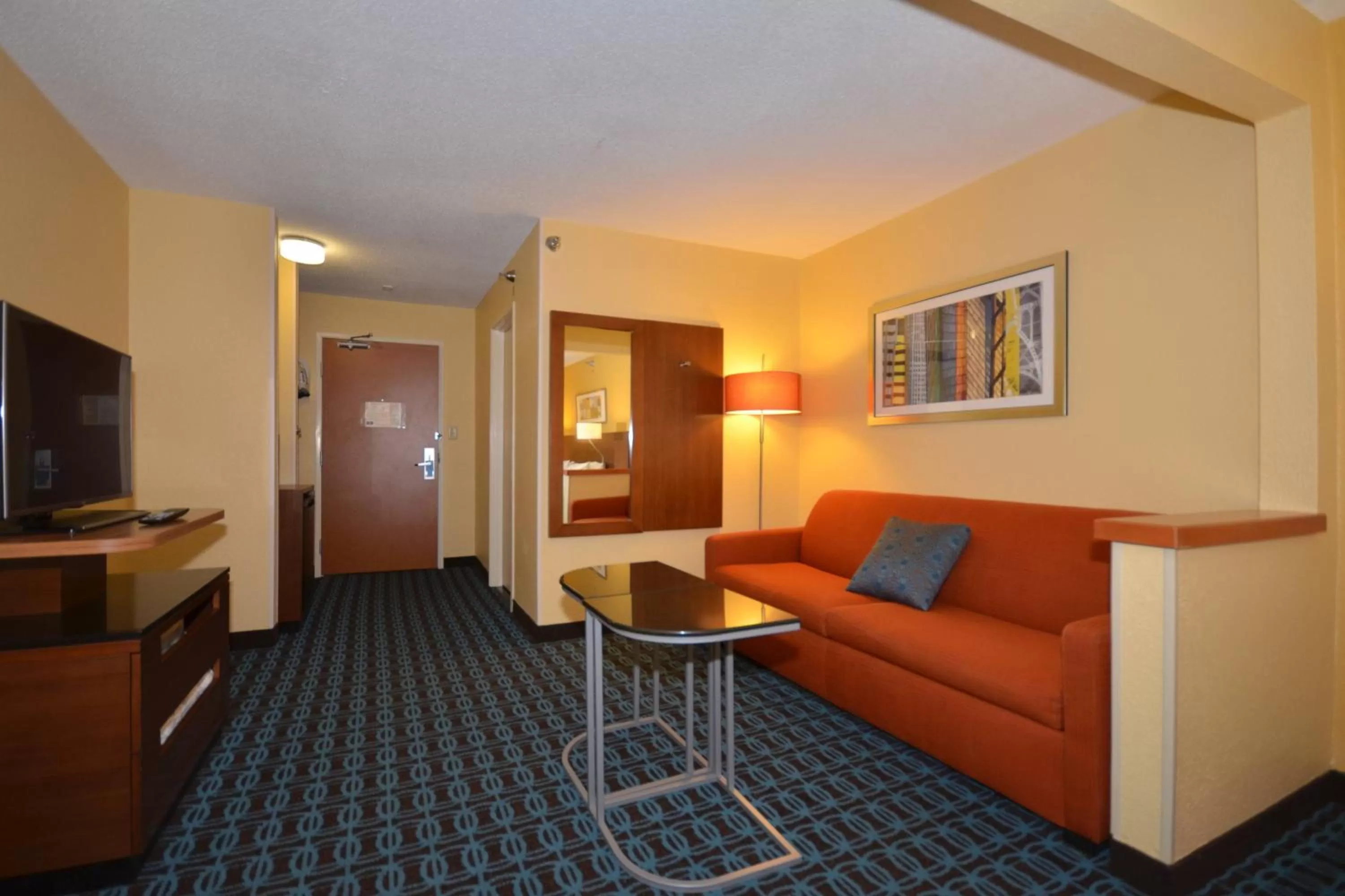 Bedroom, Seating Area in Freedom Inn