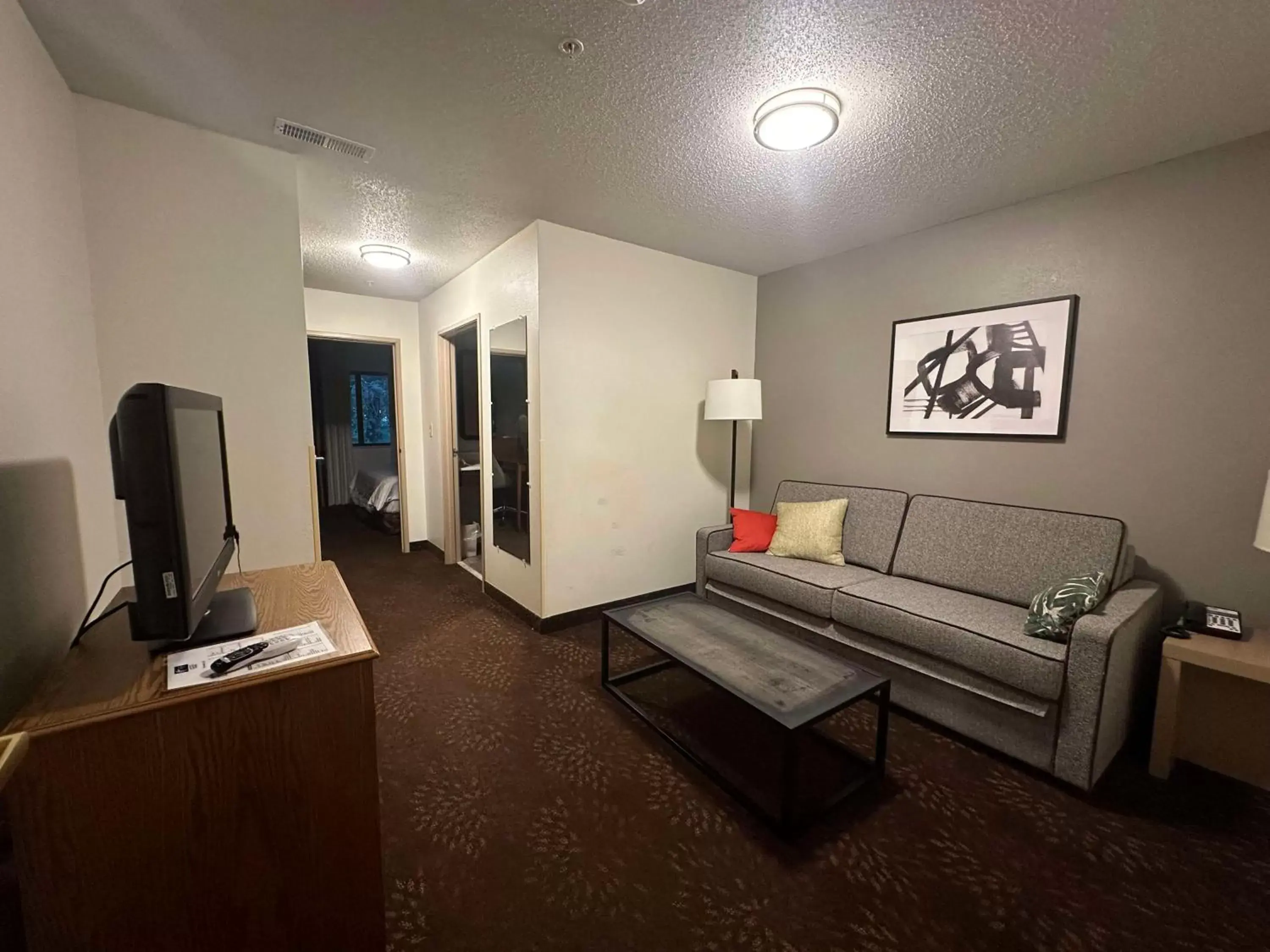 Photo of the whole room, Seating Area in SureStay Plus by Best Western Fremont I-69