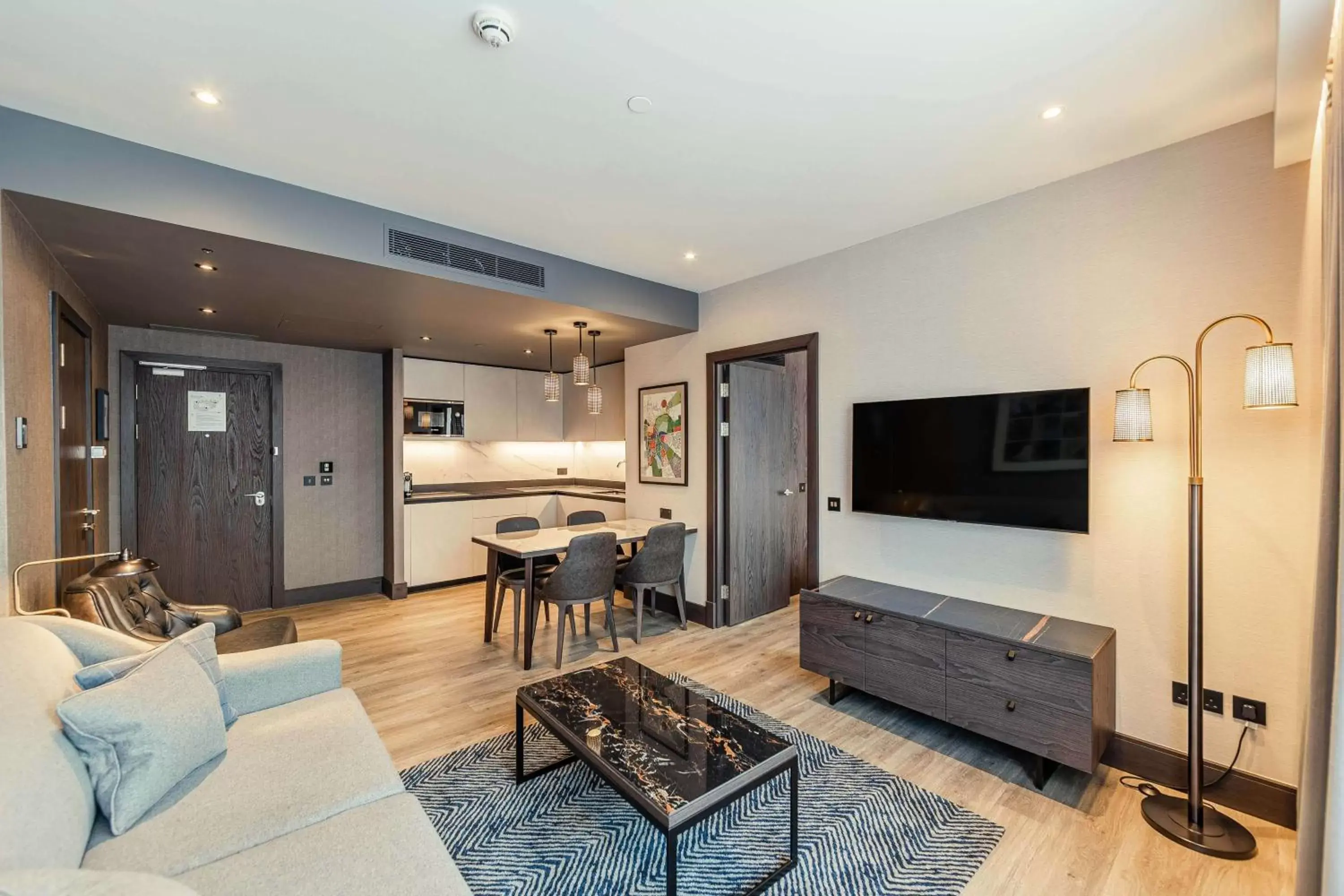 Bedroom, TV/Entertainment Center in The Fellows House Cambridge, Curio Collection By Hilton