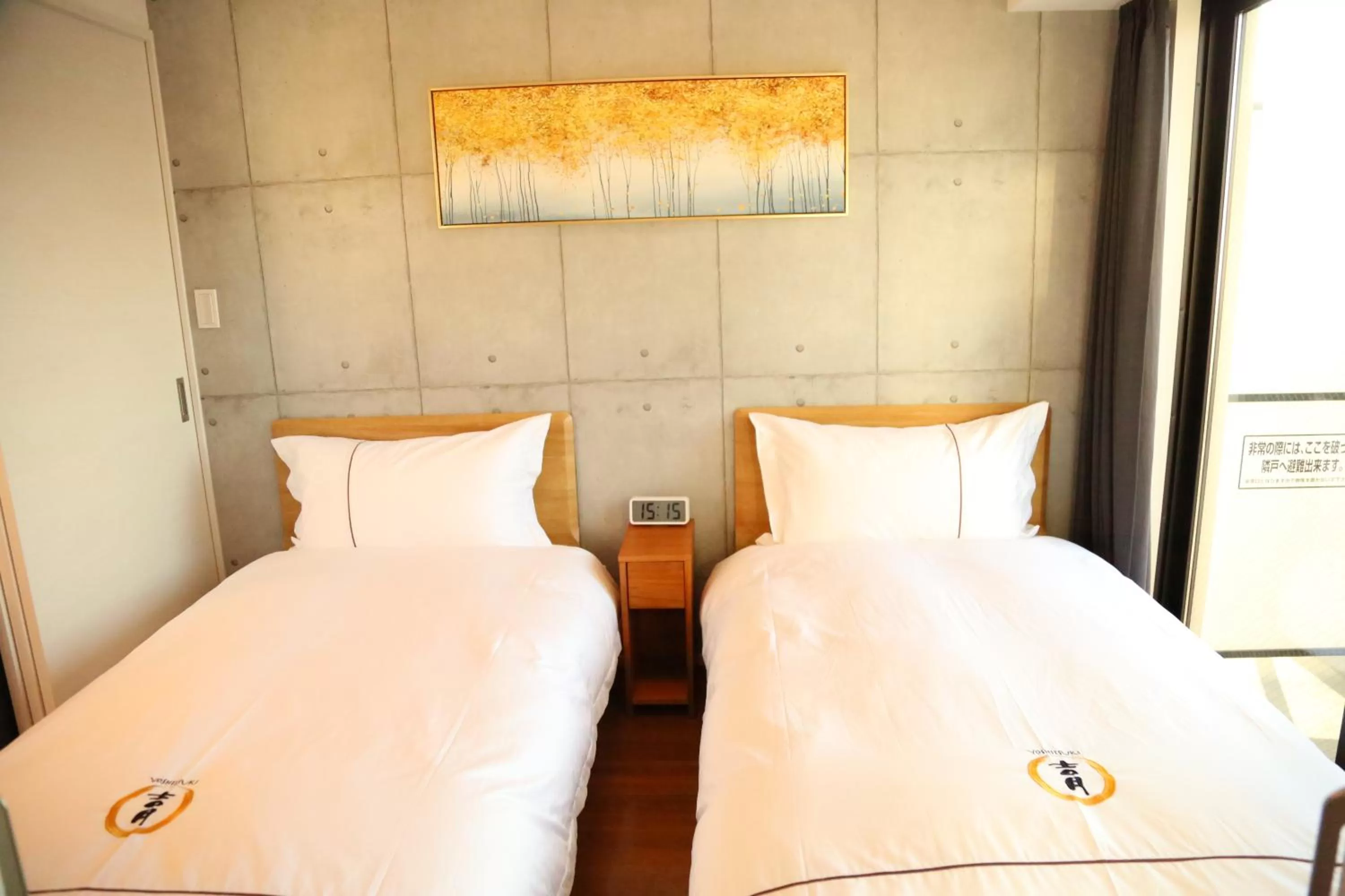 Bedroom, Bed in Yoshitsuki kaku - Yoshitsuki Apart Hotel