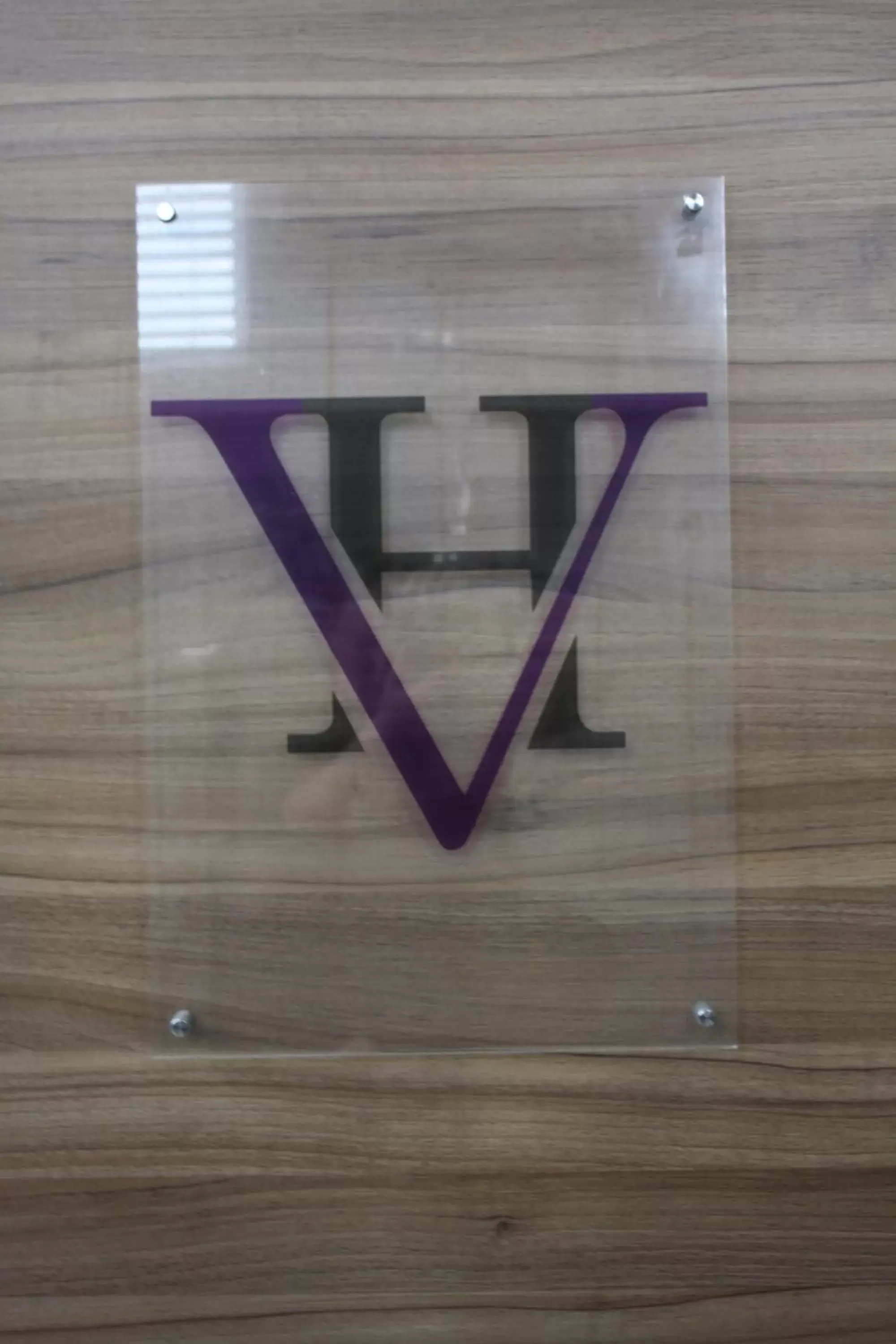 Property logo or sign in Watton Vibe Hotel