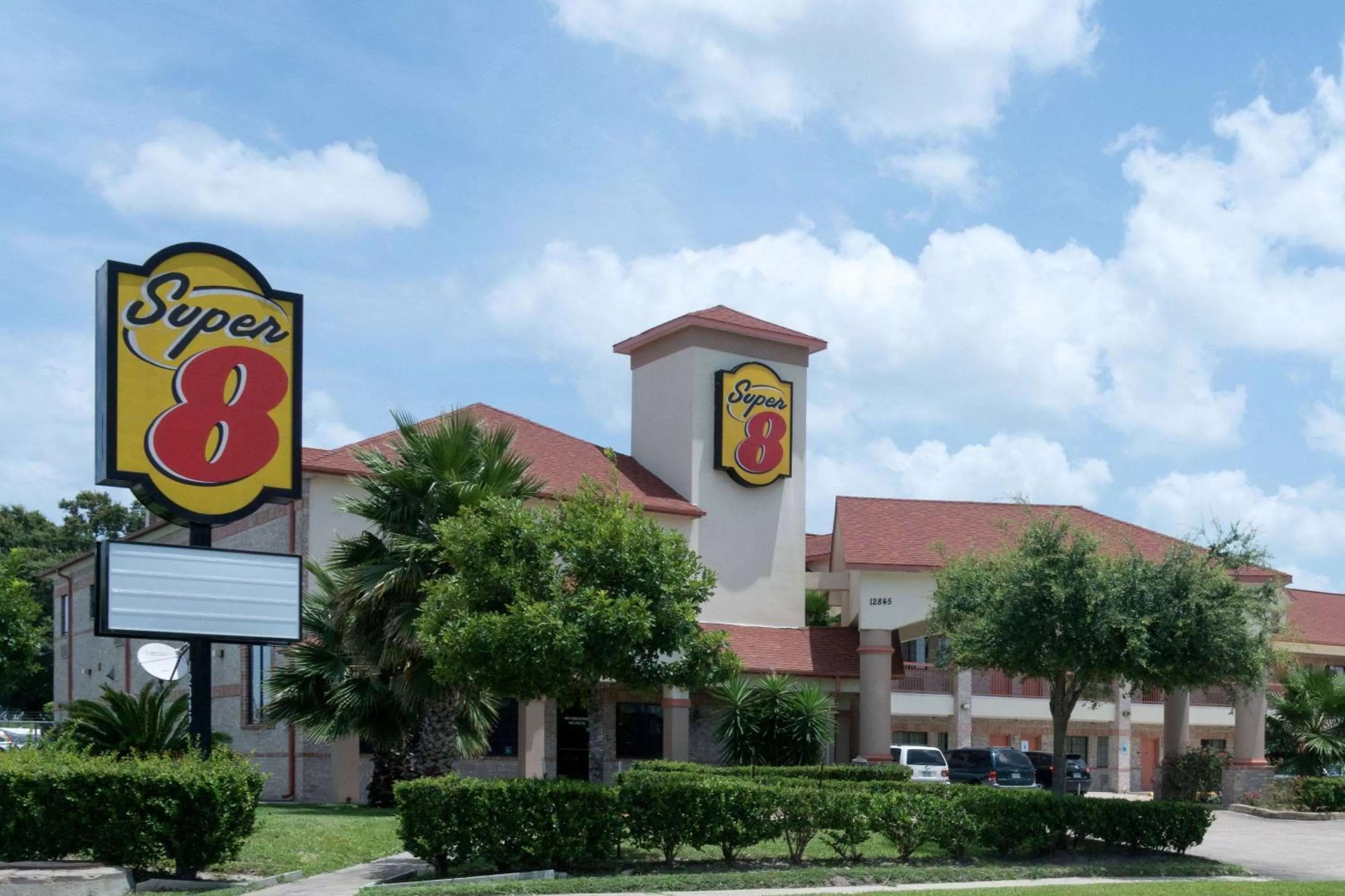 Property building in Super 8 by Wyndham Stafford Sugarland Area