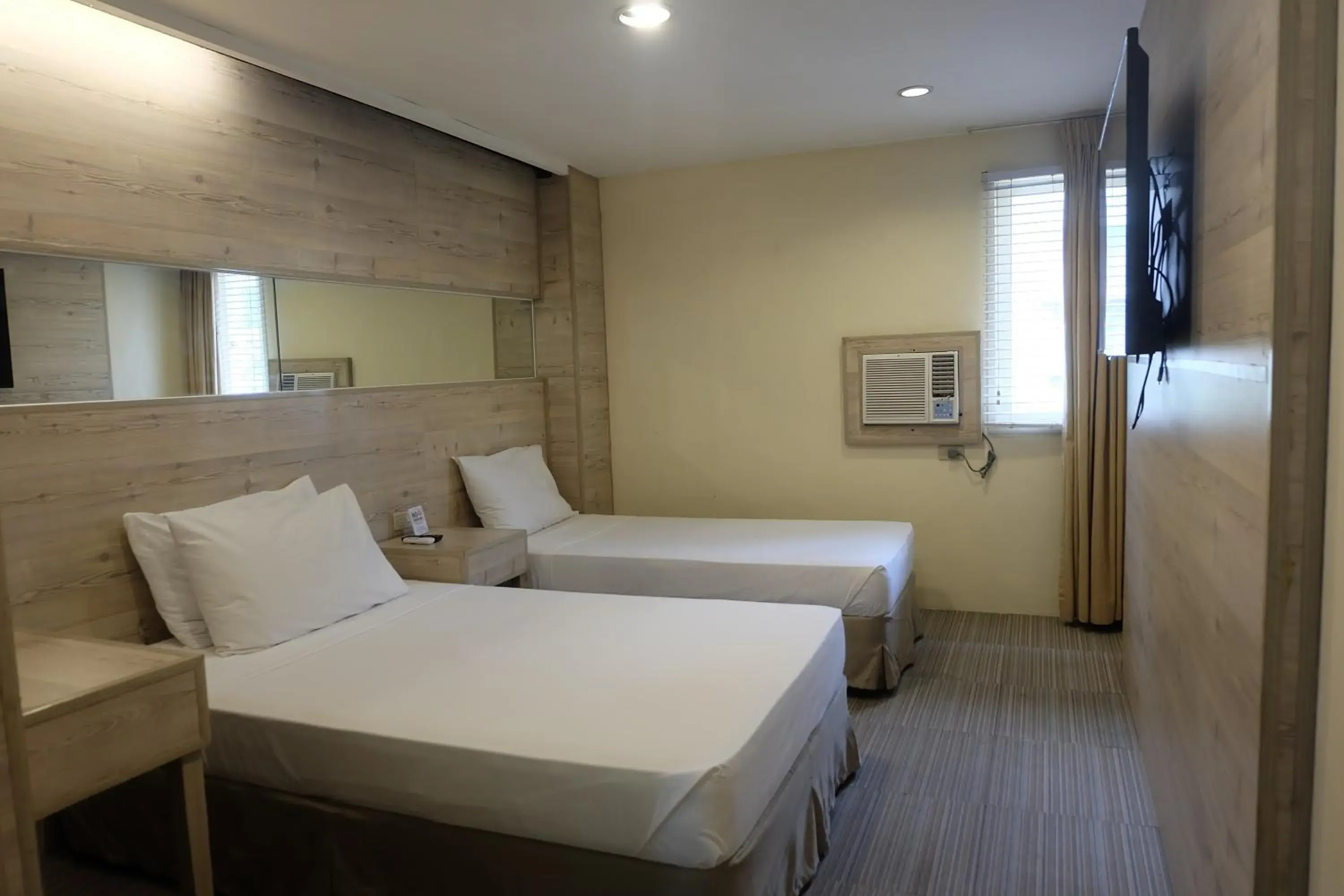 Photo of the whole room, Bed in Spaces Hotel Makati - People & Pets