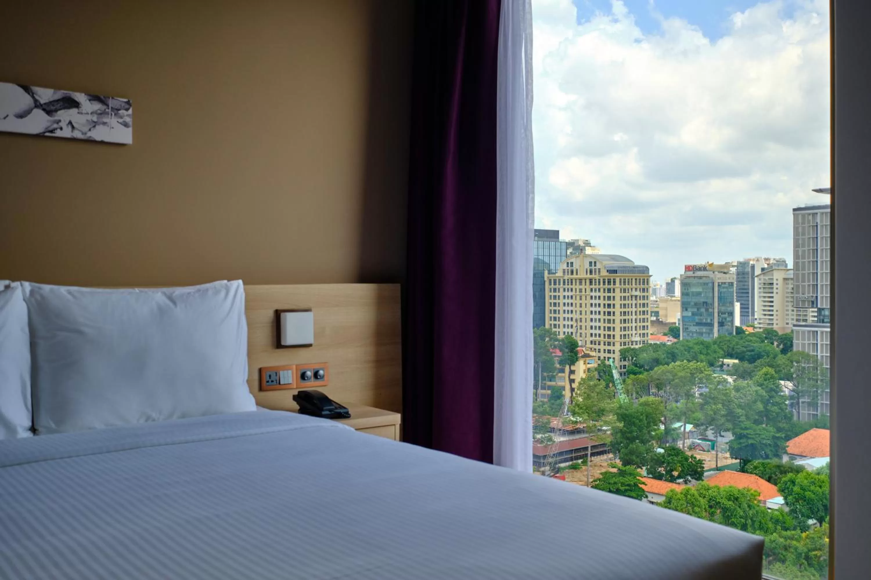 Photo of the whole room, Bed in Sotetsu Grand Fresa Saigon