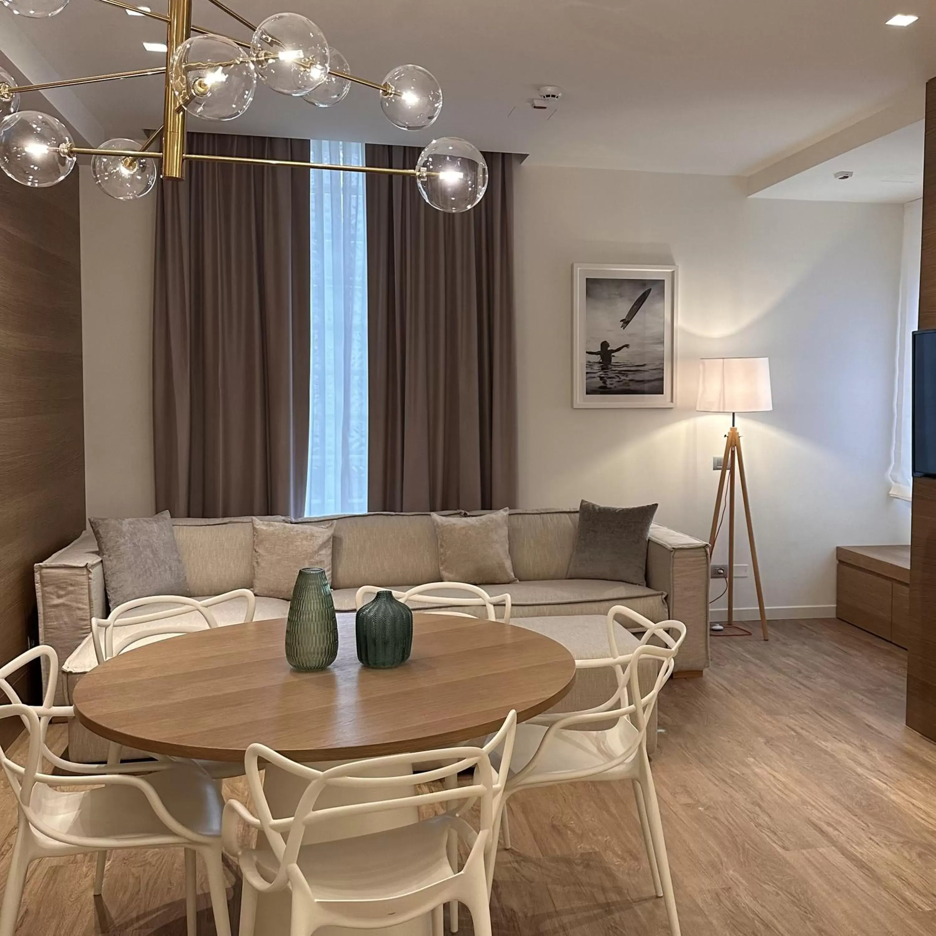 Living room, Dining Area in Metropol Ceccarini Suite