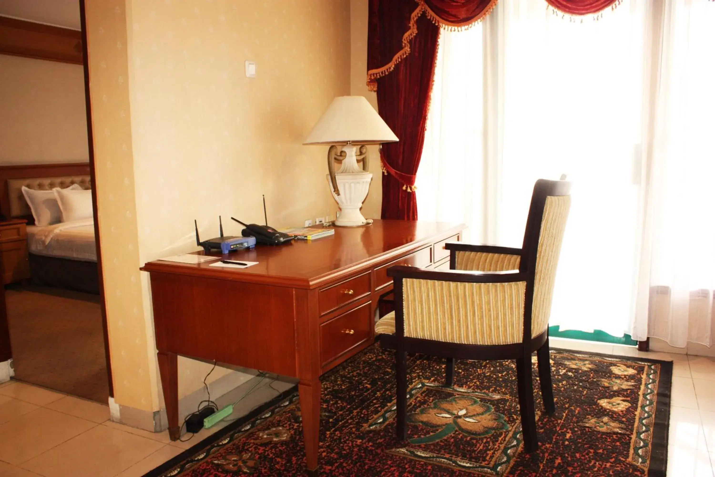 Seating area in Travellers Suites Serviced Apartments