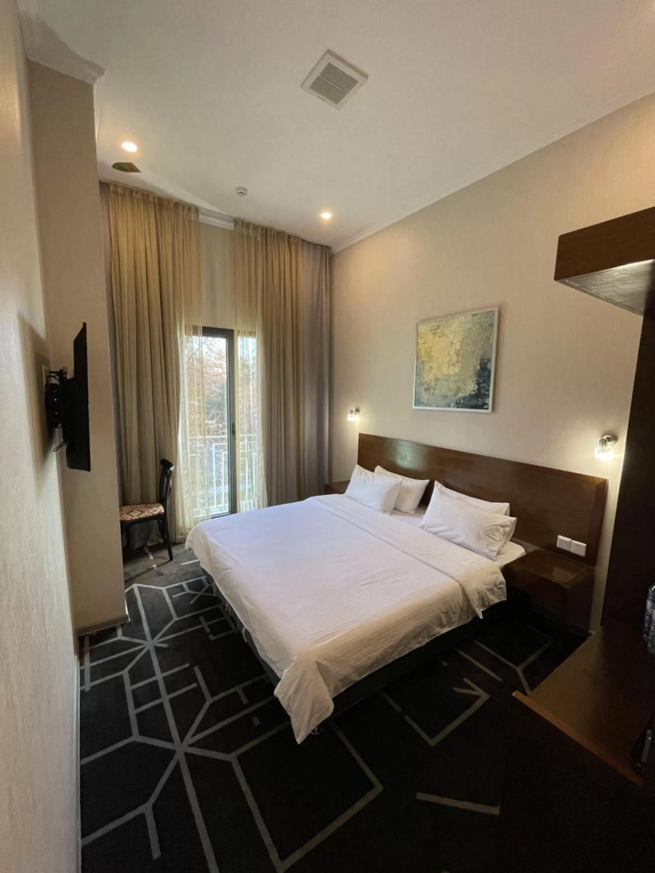 Photo of the whole room, Bed in City Centre Hotel