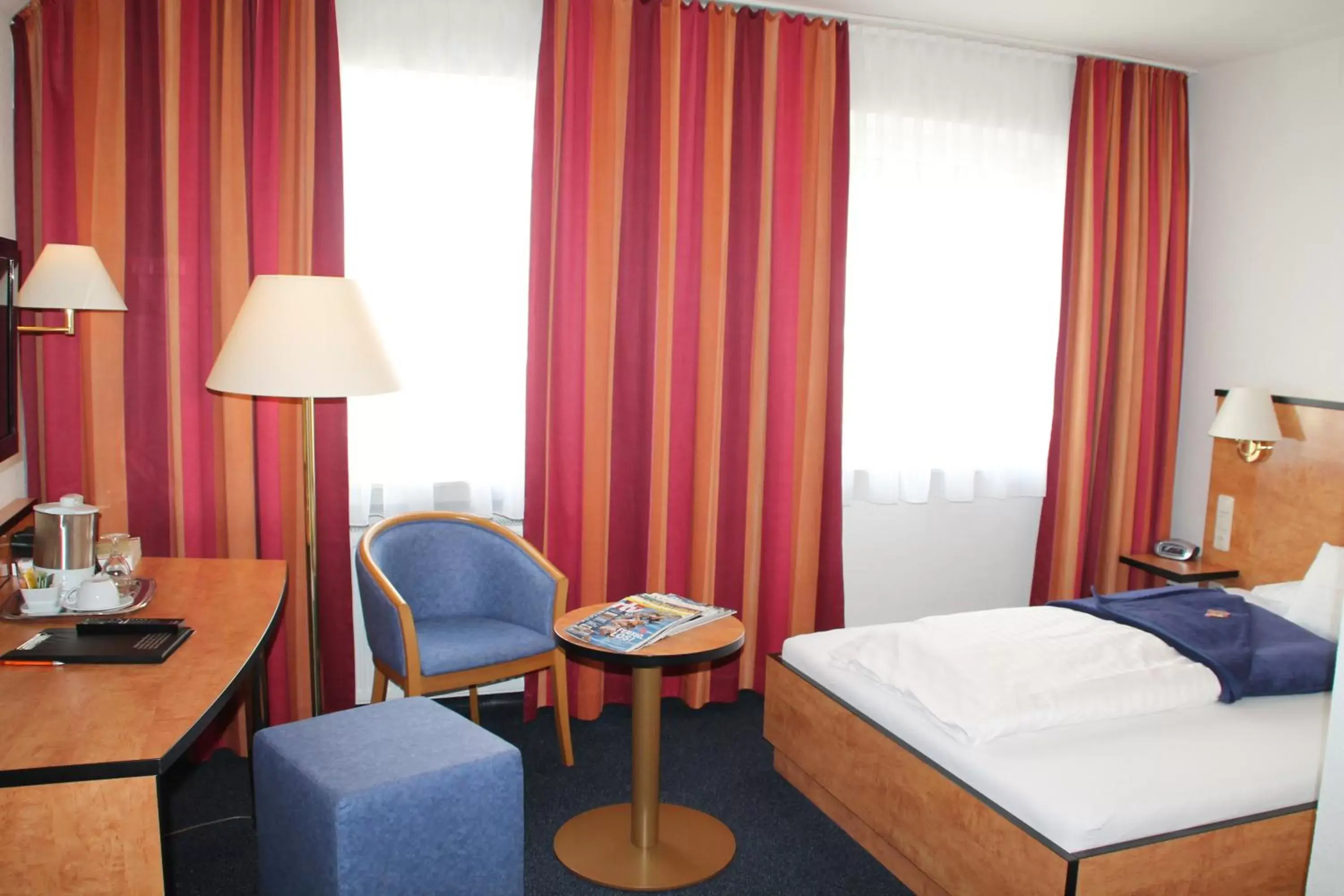 Photo of the whole room, Bed in Trip Inn Hotel Zum Riesen Hanau