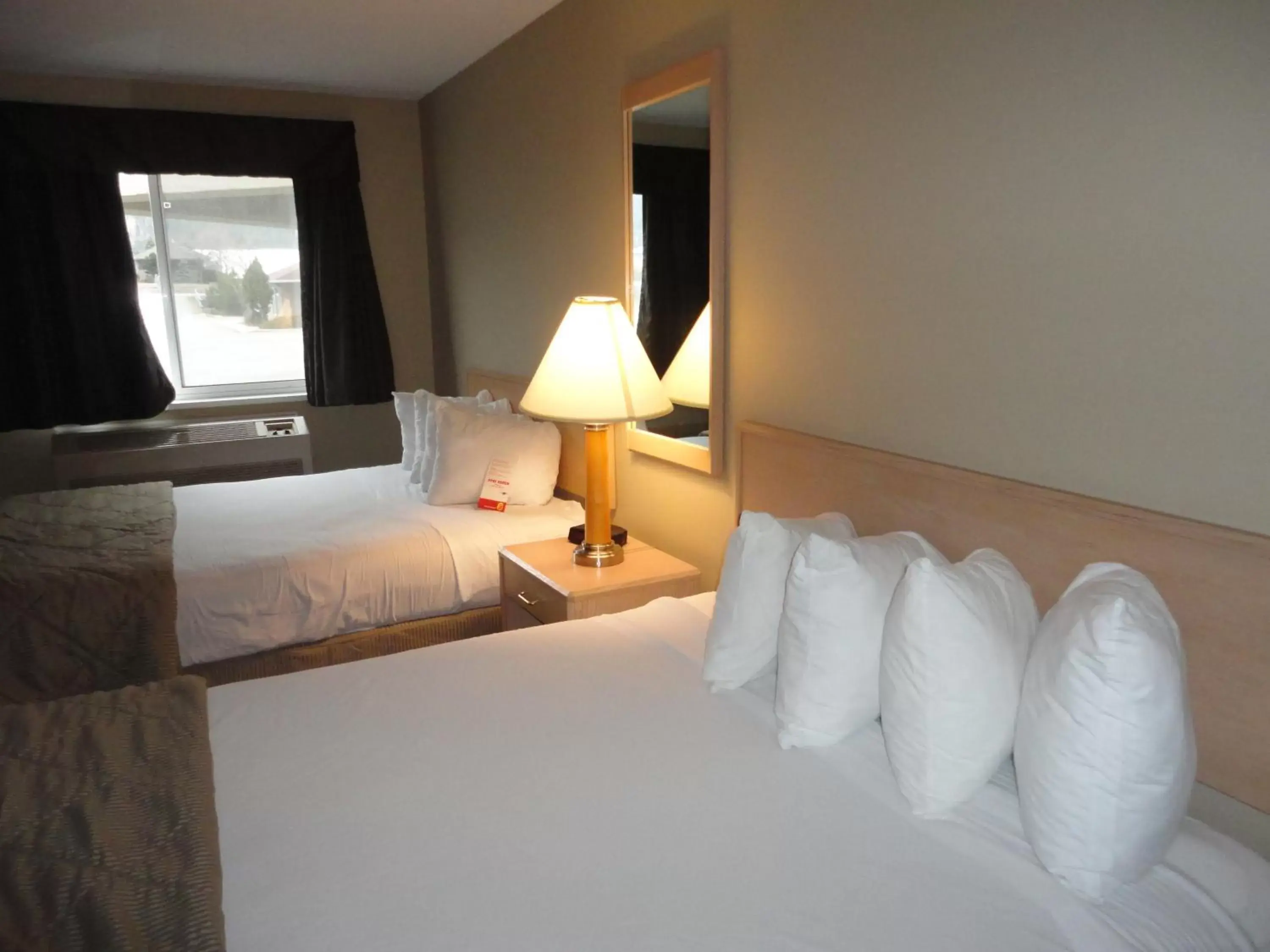 Bedroom, Bed in Super 8 by Wyndham West Kelowna BC Bedroom, Bed in Super 8 by Wyndham West Kelowna BC