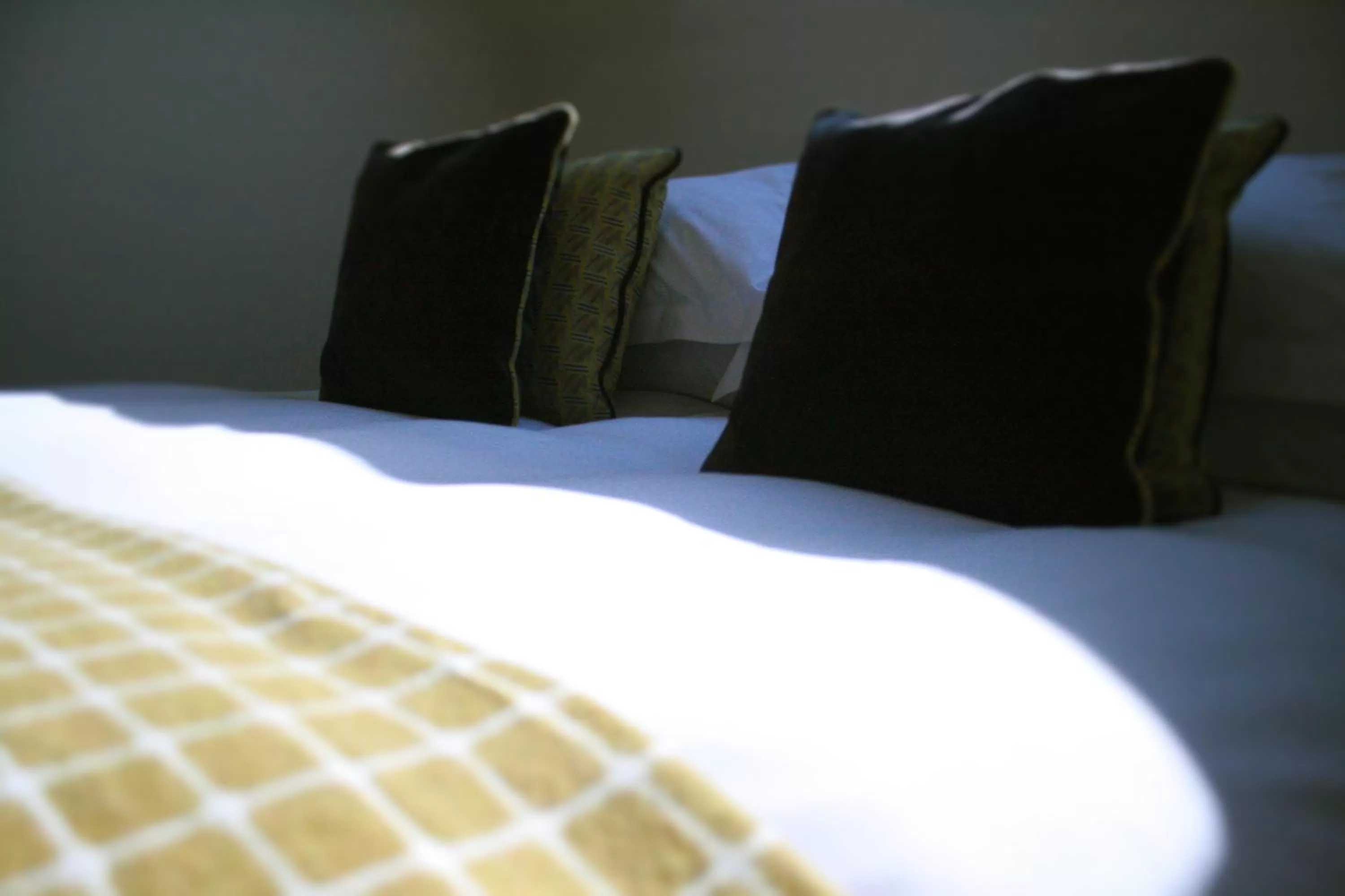 Bed in Cat and Custard Pot Inn